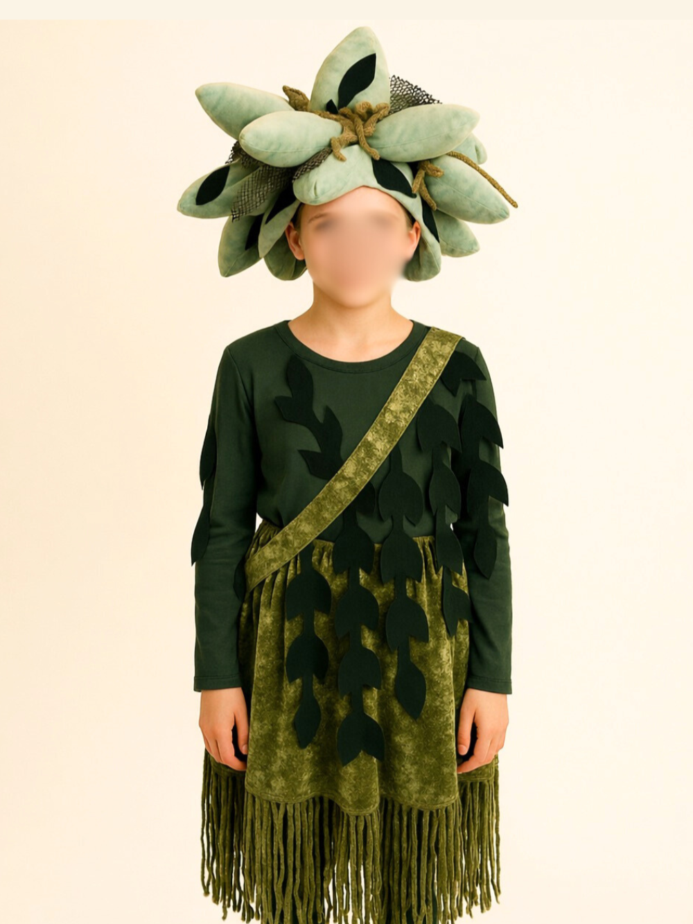 DIY seaweed costume for The Little Mermaid JR musical, featuring a green layered dress with leaf-shaped appliqués and fringe hem, paired with a headpiece upcycled from an Amazon succulent pillow to create a lightweight underwater ensemble look.