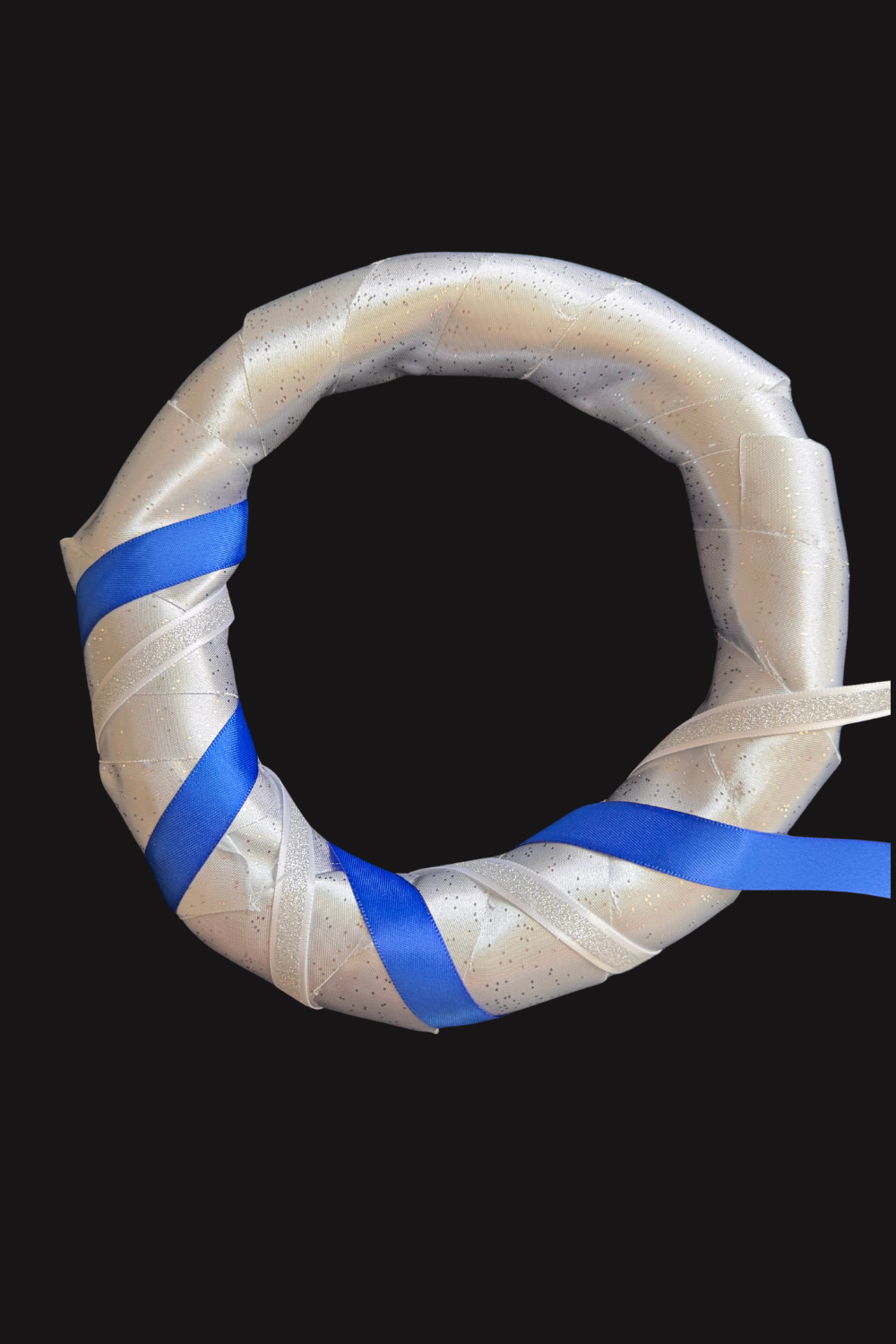 Blue and silver ribbons were spiraled around the halo for color contrast and movement.