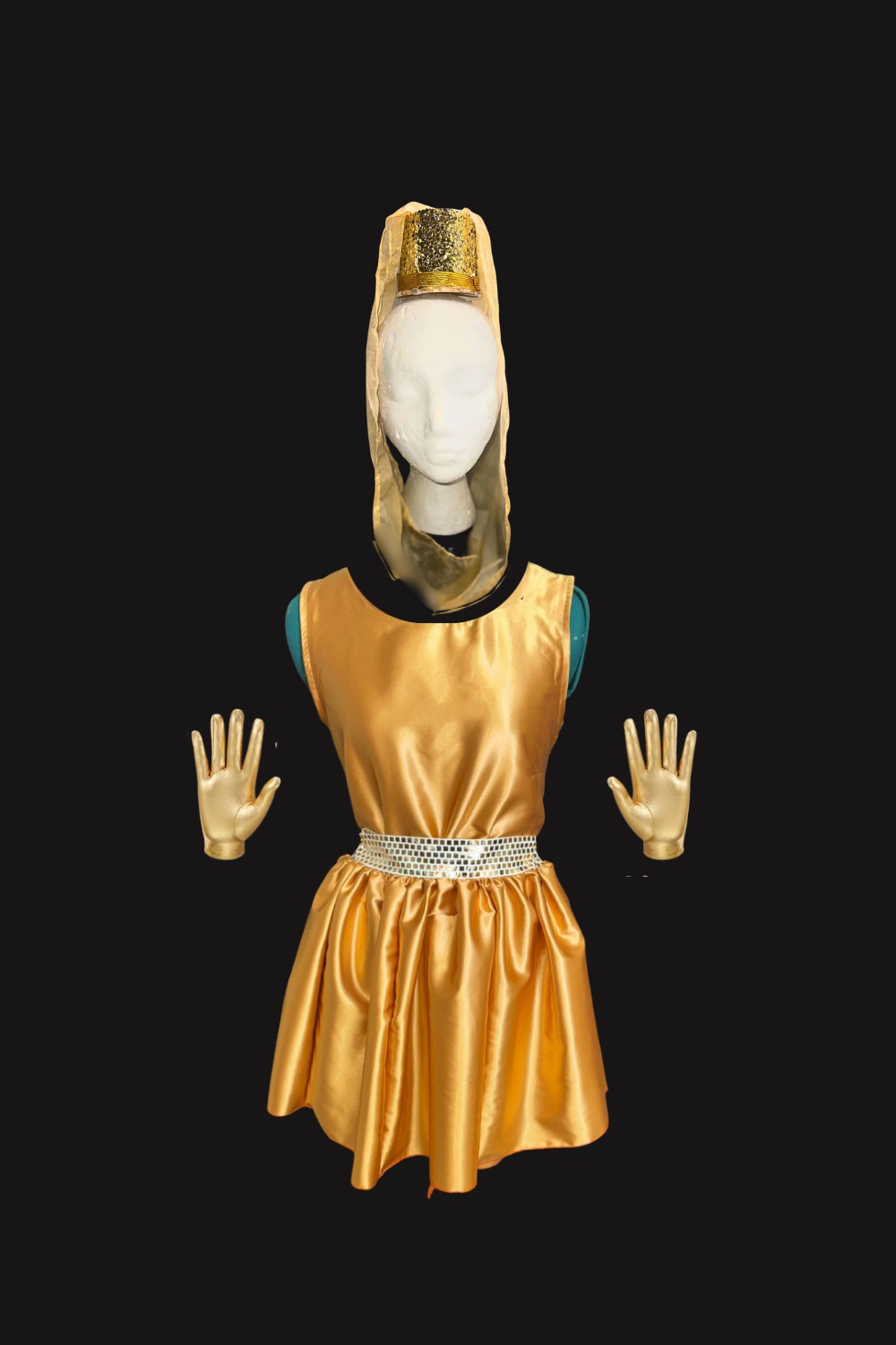 Cave of Wonders tapper costume for Aladdin Jr featuring gold dress, matching headpiece, and gloves for a school musical performance, set against a black background.