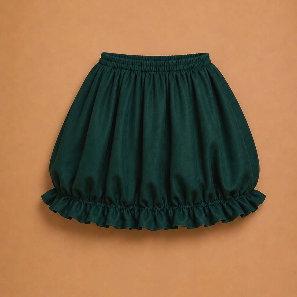 Dark green ruffled bubble skirt for an Elf Jr. the Musical costume, cut with a gathered elastic waist and a soft ruffled hem for stage movement. Pairs well with striped tights and a holiday-trimmed vest for an old-world elf ensemble look in school an