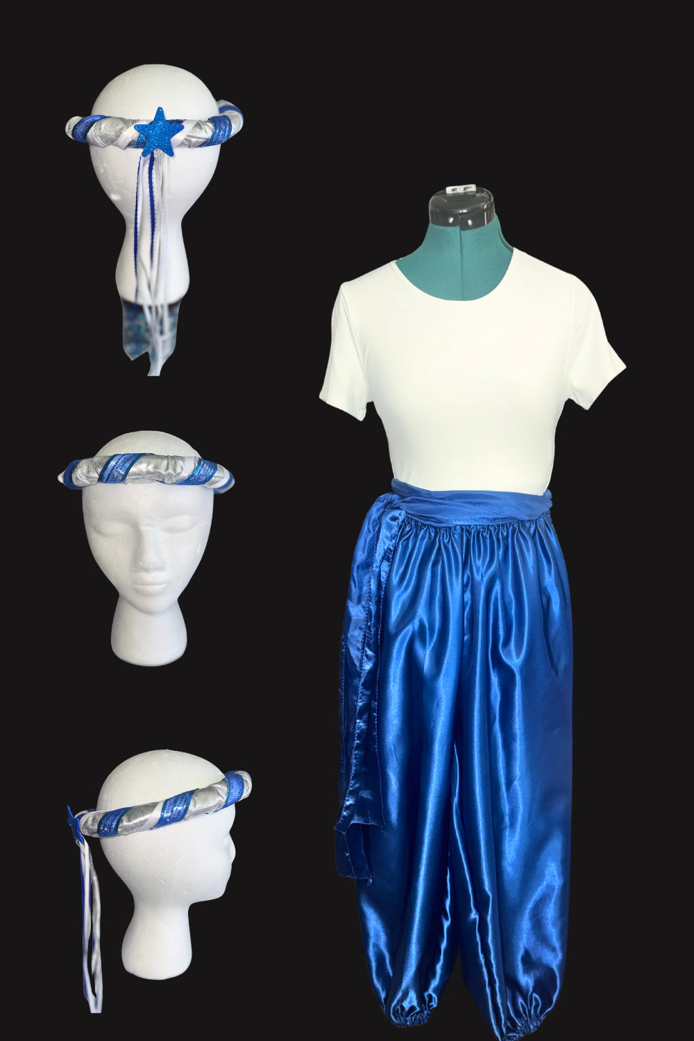 Costume mannequin dressed in white T-shirt and blue satin pants, display of three fabric headbands with silver, blue, and white patterns on white mannequin heads against black background.