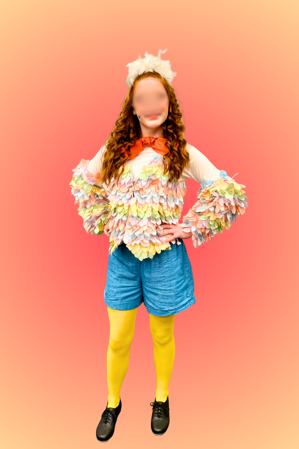Volunteer-made Scuttle costume for a youth theater production, created by upcycling a vest with layered leaf-shaped taffeta pieces to mimic feathers, paired with shorts, tights, and simple accessories for a lightweight, stage-friendly look.