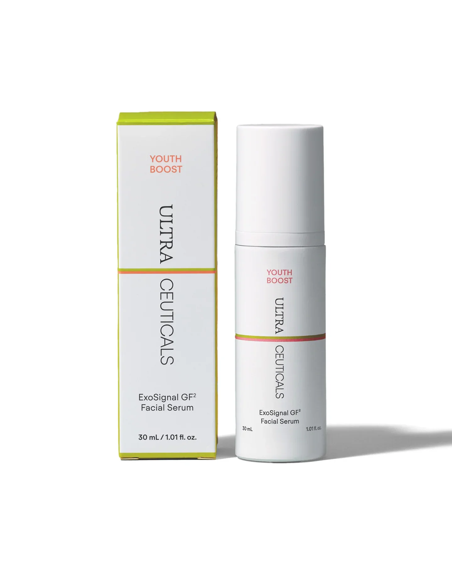 Een kleine fles met Skinderma Exo-Ageless Exosome serum op een witte ondergrond, met een medische machine en een witte box met het woord 'SKINDERMA' op de achtergrond.
