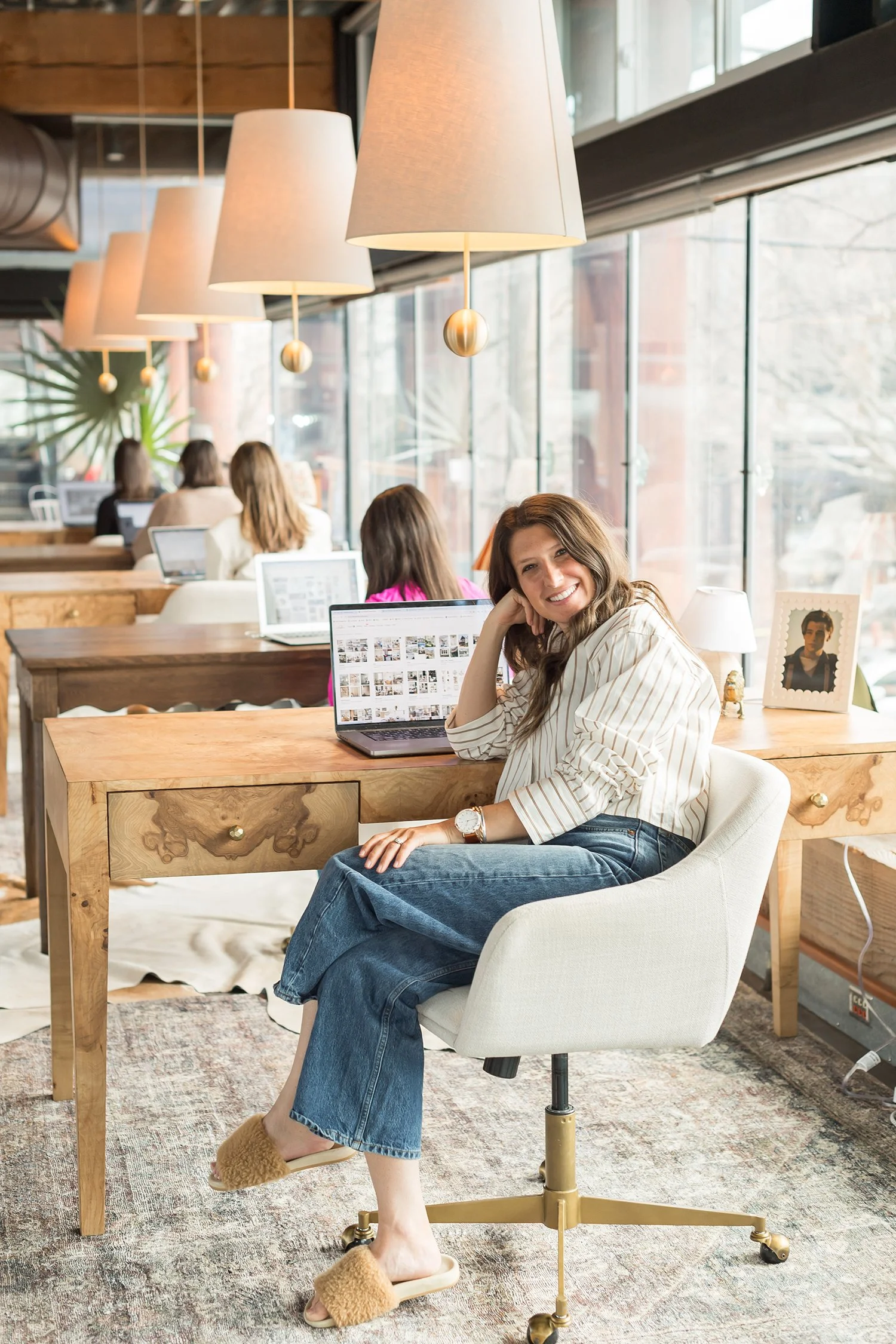 Katie Goodrich, founder of Ivory & Bone Interiors, in her Newburyport studio