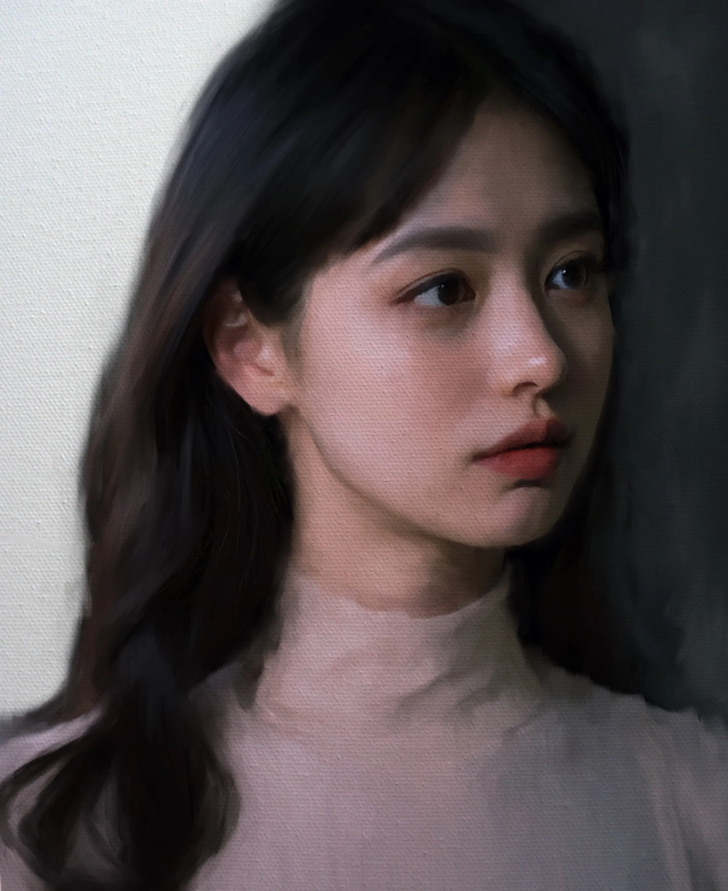Portrait of a woman with dark hair, wearing a light-colored turtleneck, looking to the side.