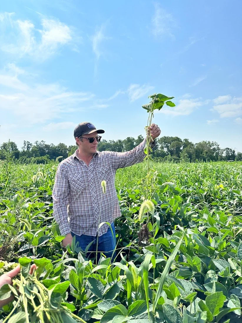 jay holding roots at stonehouse.jpg