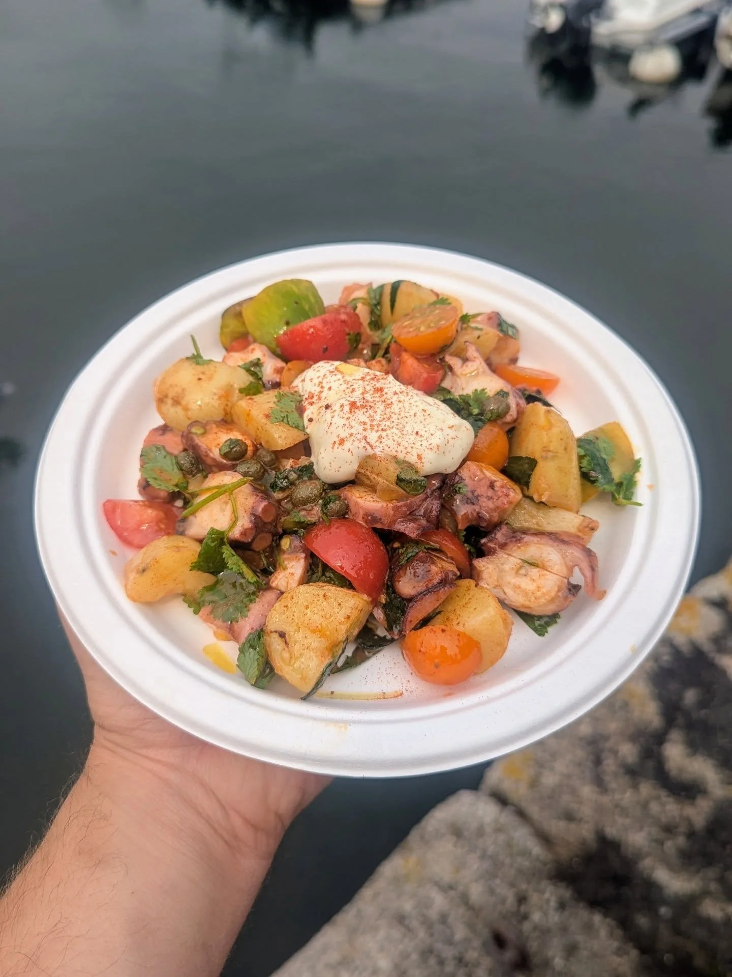 Octopus, potato and tomato - can't beat the classics!
 
We get our octopus from Will on FH58 who catches them in his lobster pots in the Fal Bay. We freeze them to tenderise then braise in a stock until tender.

The dish is a simple one - octopus, sp
