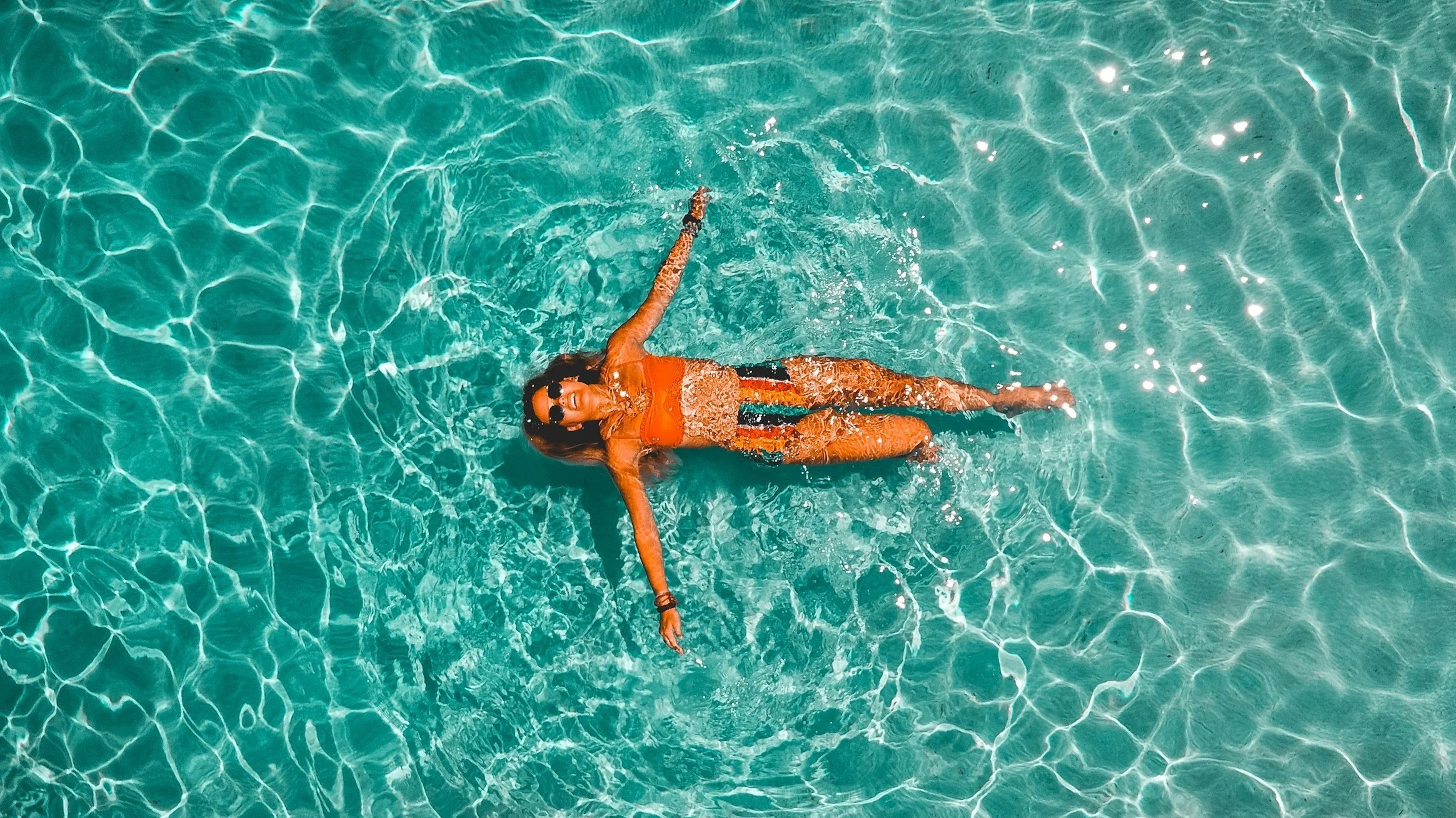 Relaxing in The Palms Home Pool
