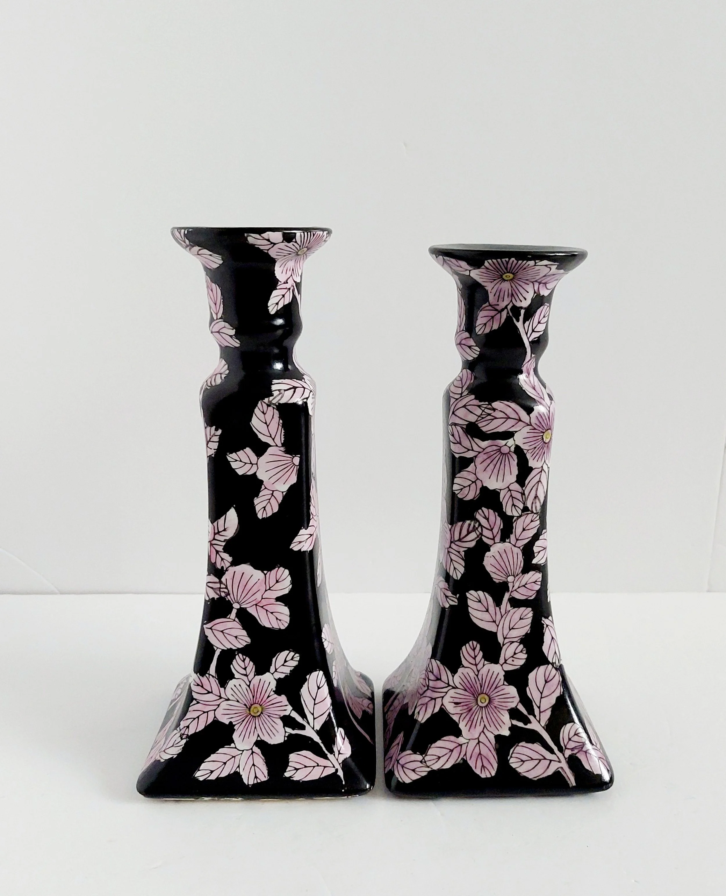 Ceramic hand painted floral design candle stick holders, set of two