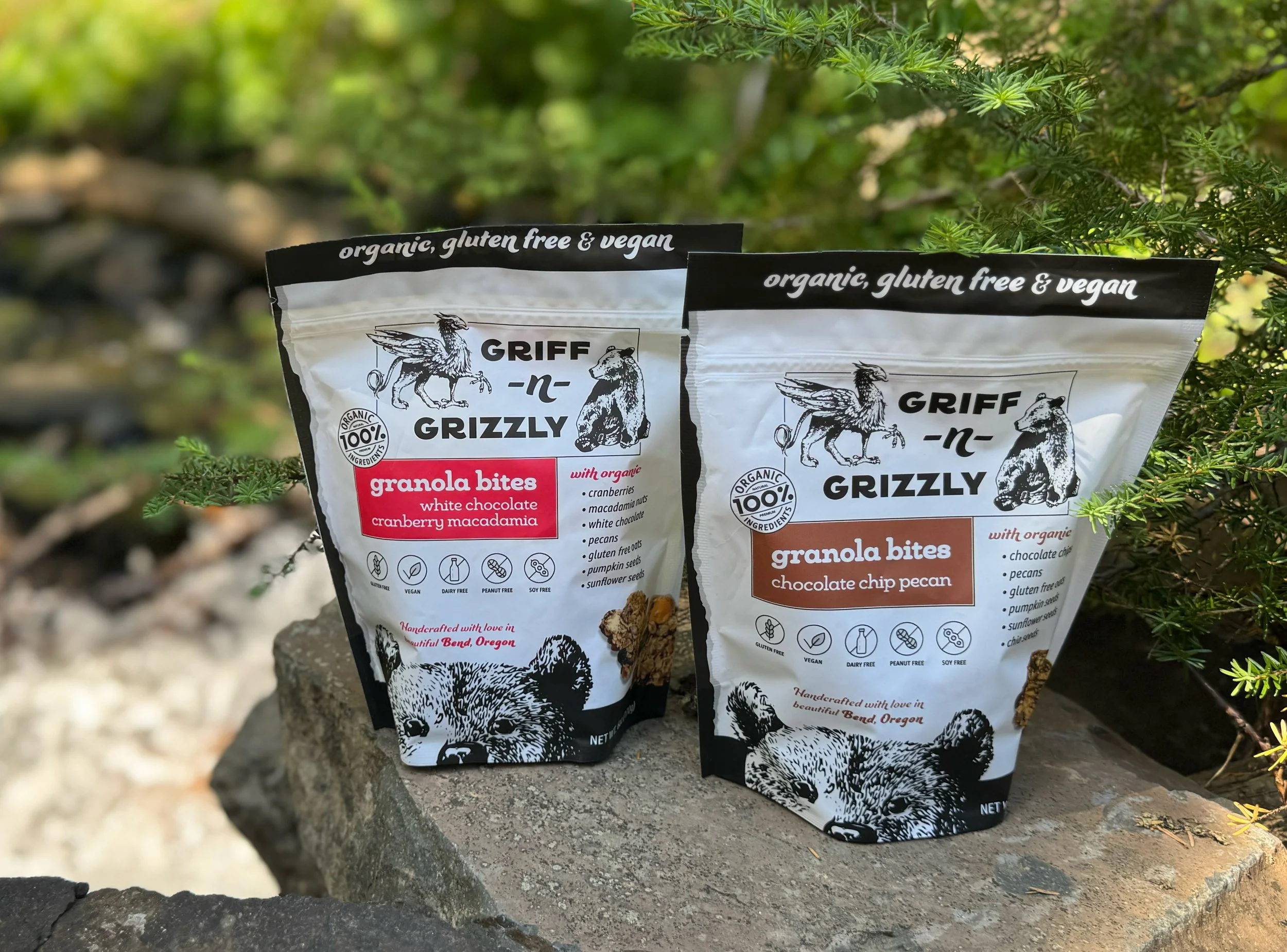 griff-n-grizzly bags on a stone near a waterfall
