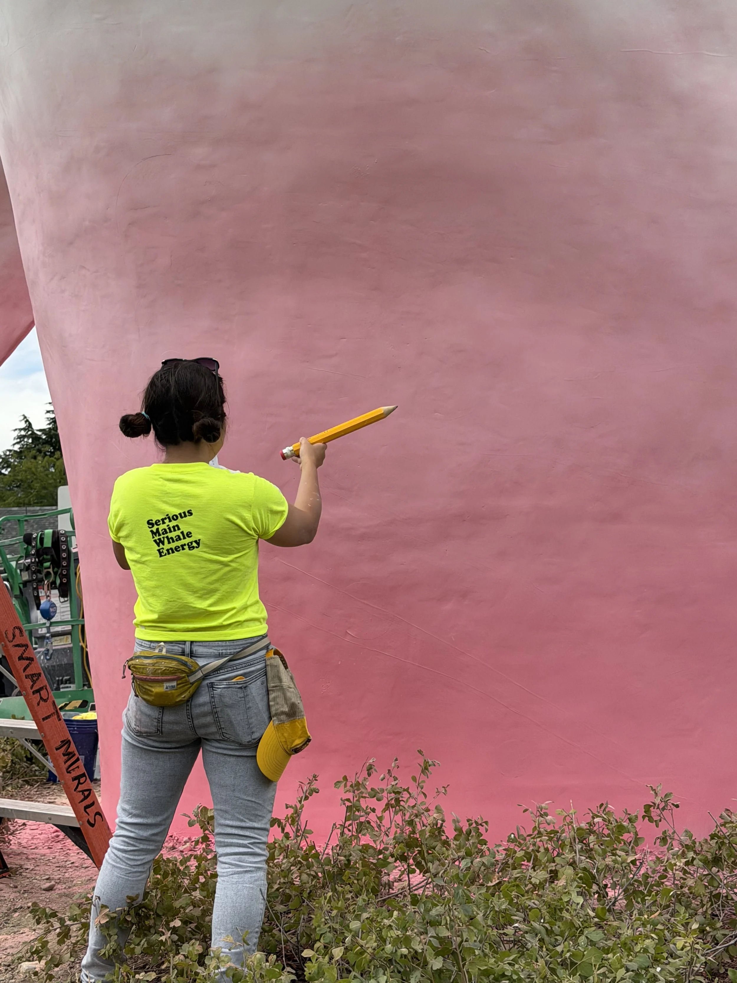 Behind the scenes of the "Open Your Eyes" mural process. Images courtesy of the artist.