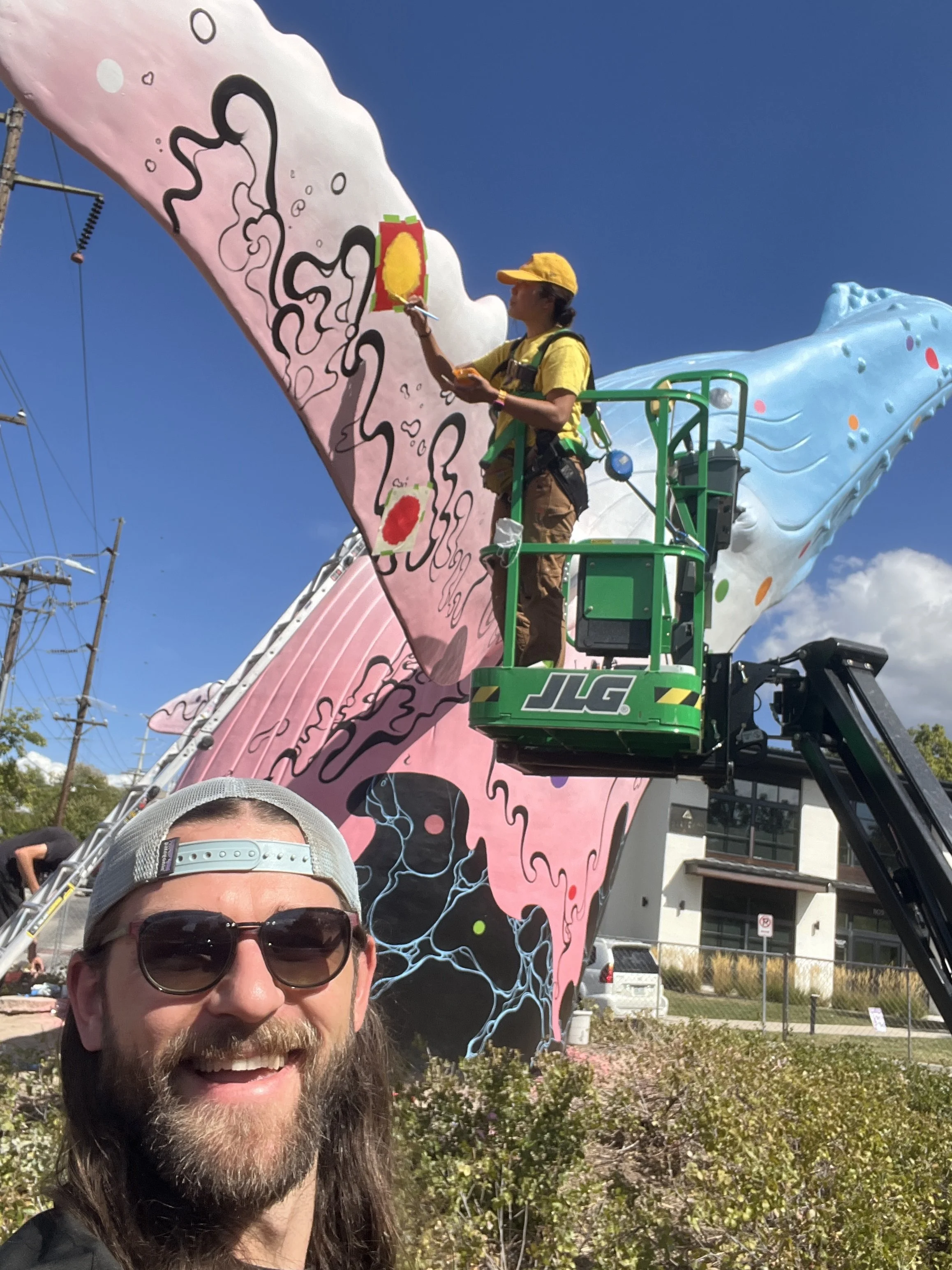 Behind the scenes of the "Open Your Eyes" mural process. Images courtesy of the artist.