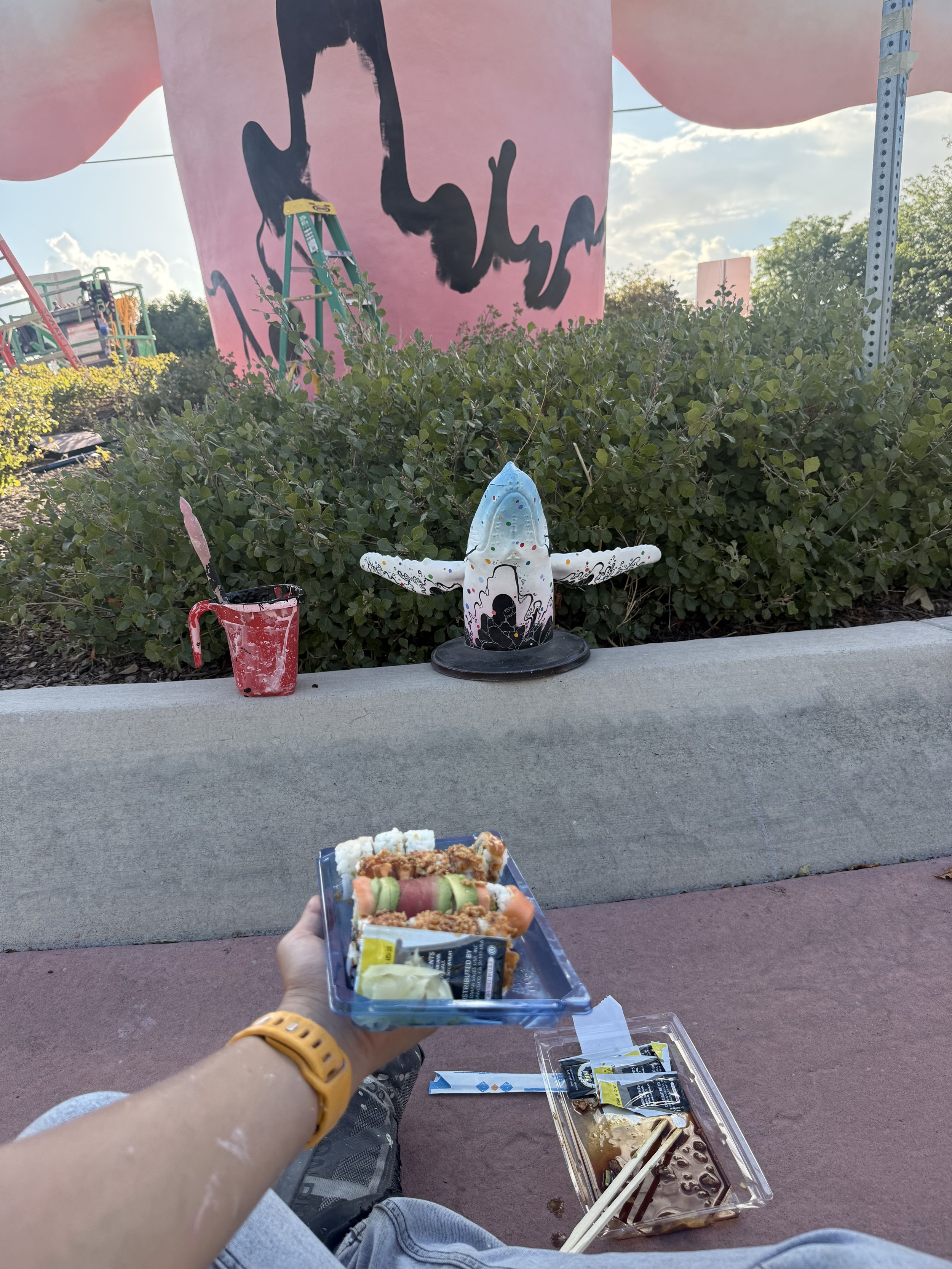 Behind the scenes of the "Open Your Eyes" mural process. Images courtesy of the artist.