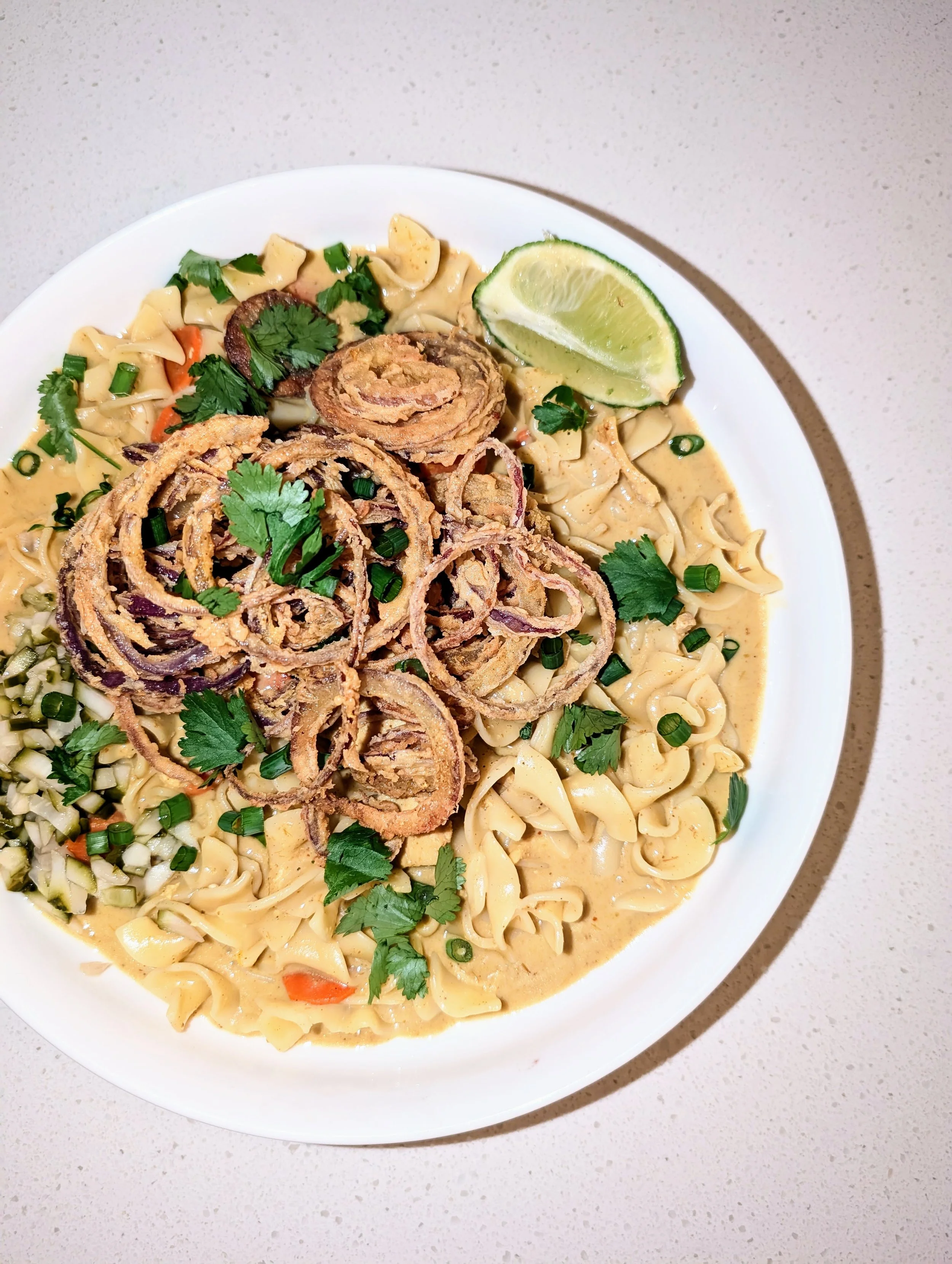 Khao Soi with Dill Pickles and Onion Rings