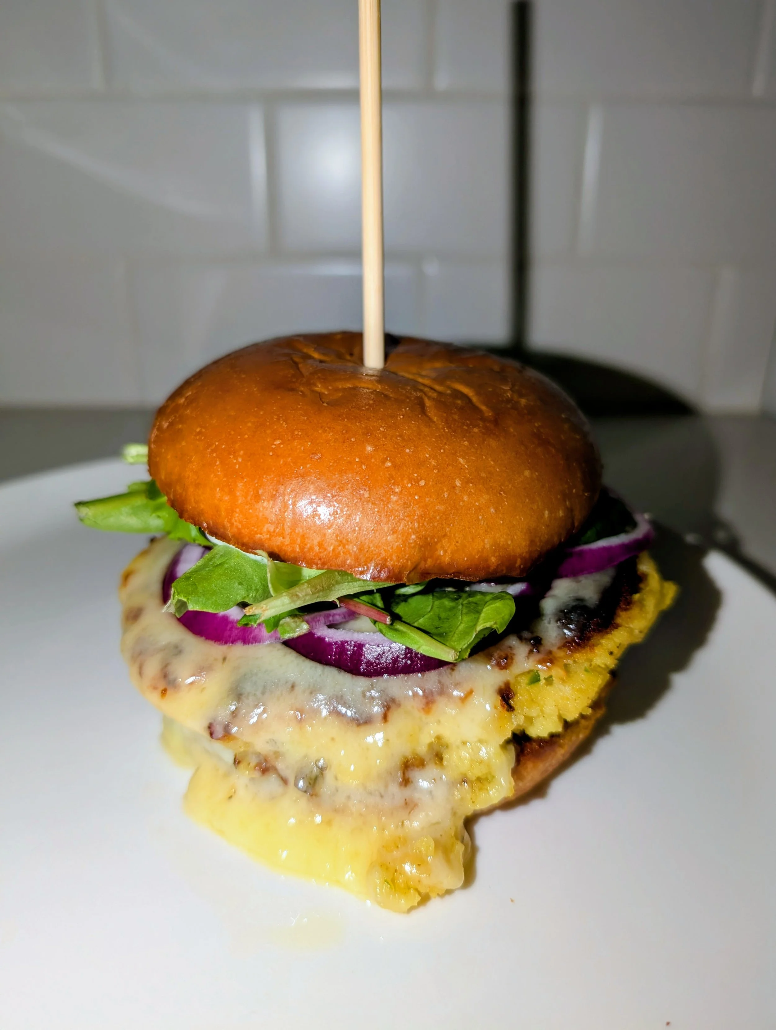Aloo Tikki Burger With Jalapeno, White Cheddar, and Cilantro Mayo