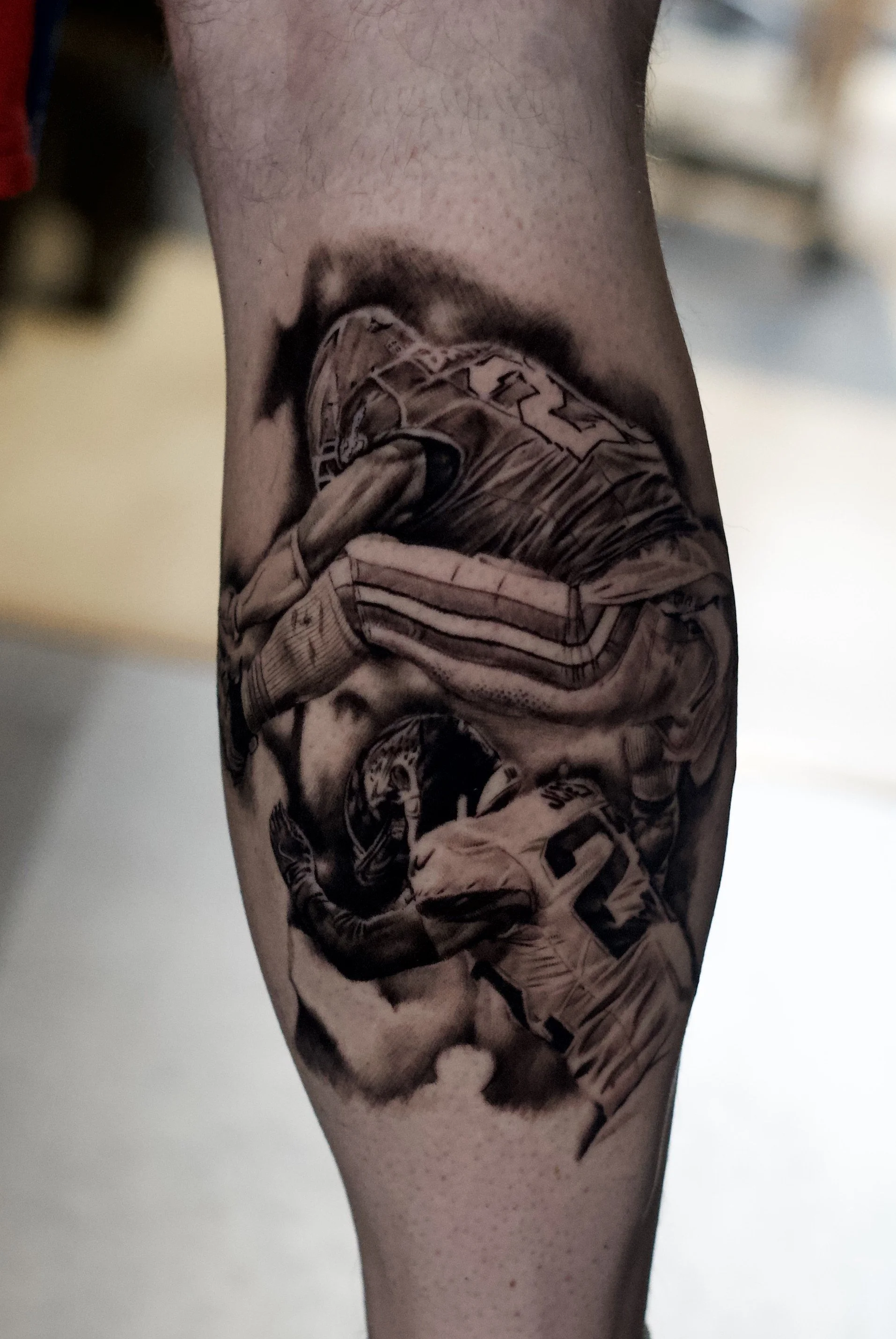 Black and Grey Saquon Barkley Hurdle Philadelphia Eagles Realism Tattoo by Jeff Beck