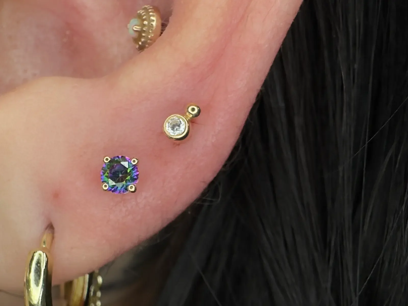 2nd and 3rd lobe piercings by Shannon Sanderson