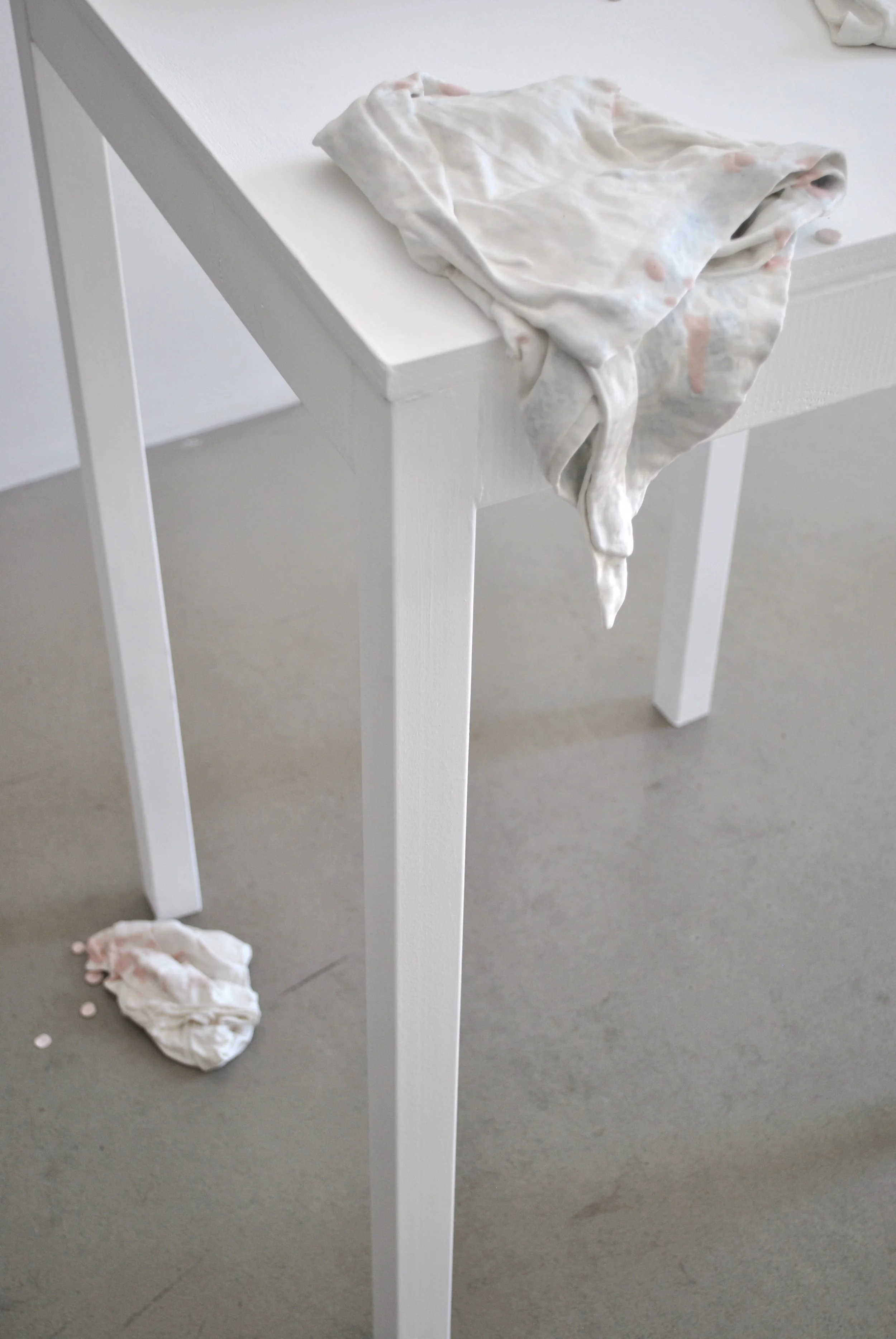 Zara Collins After the Cake (Detail) 2022-23 Porcelain, glaze, wood table, strawberry & cream essence