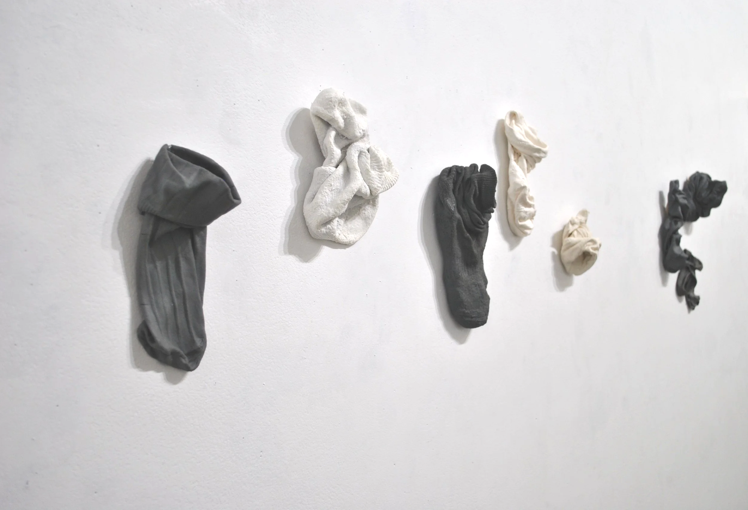 Zara Collins Who will mend my clothes when you are gone? 2026 Porcelain, Egyptian paste, stain, underglaze Photo: Zara Collins