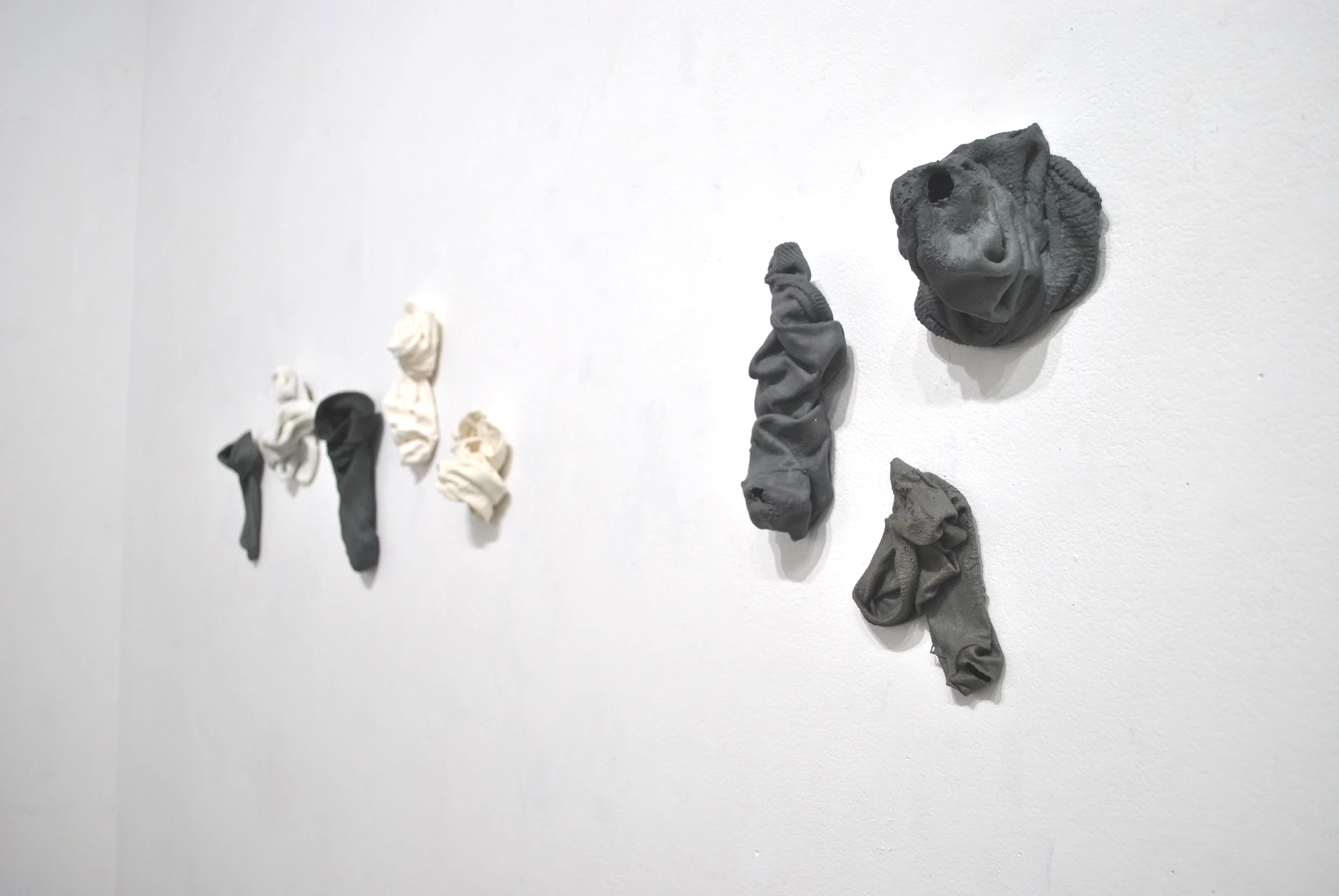 Zara Collins Who will mend my clothes when you are gone? 2026 Porcelain, Egyptian paste, stain, underglaze Photo: Zara Collins