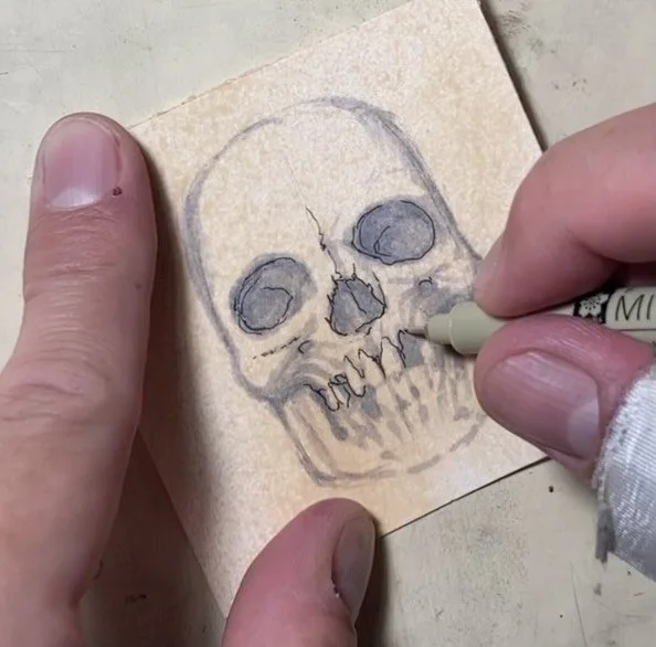 100 Skulls! Each 3&rdquo; x 3&rdquo;, each unique, one of a kind, and collectable! New ones dropping five times a week! $25 a pop&mdash; Cheap! 

&ldquo;26&rdquo;, ink and marker on cold-pressed acid-free 140 lb watercolor paper, 3&rdquo; x 3&rdquo;,