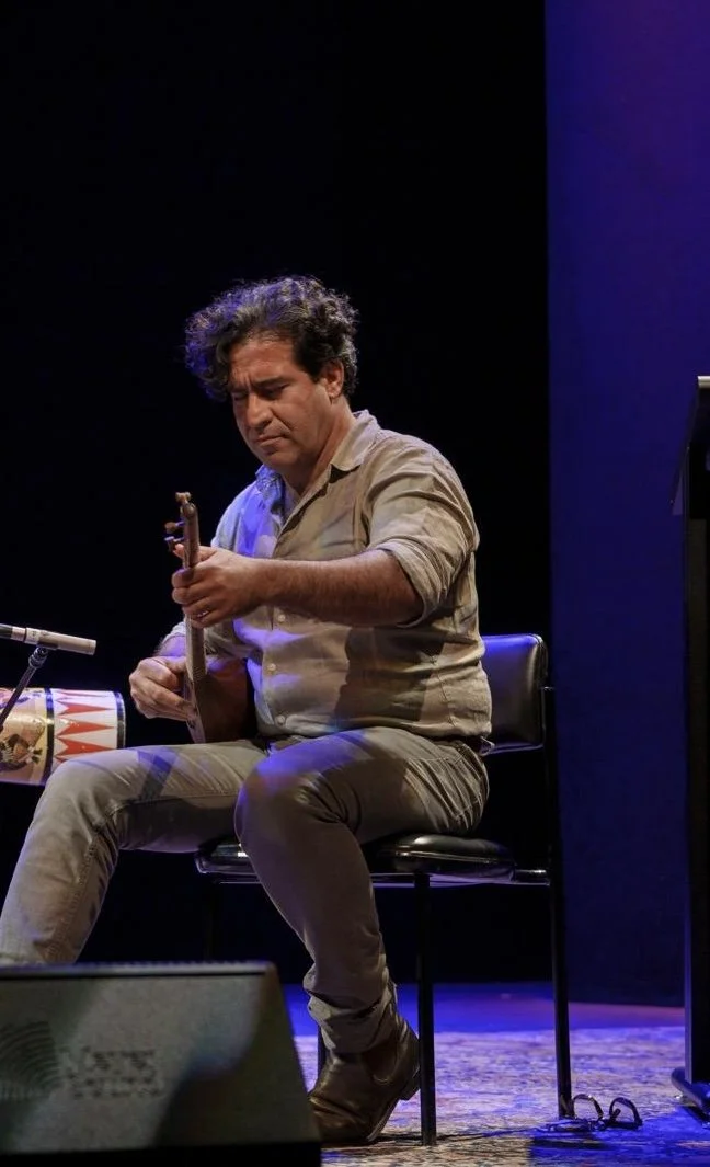 Malek playing Persian Setar