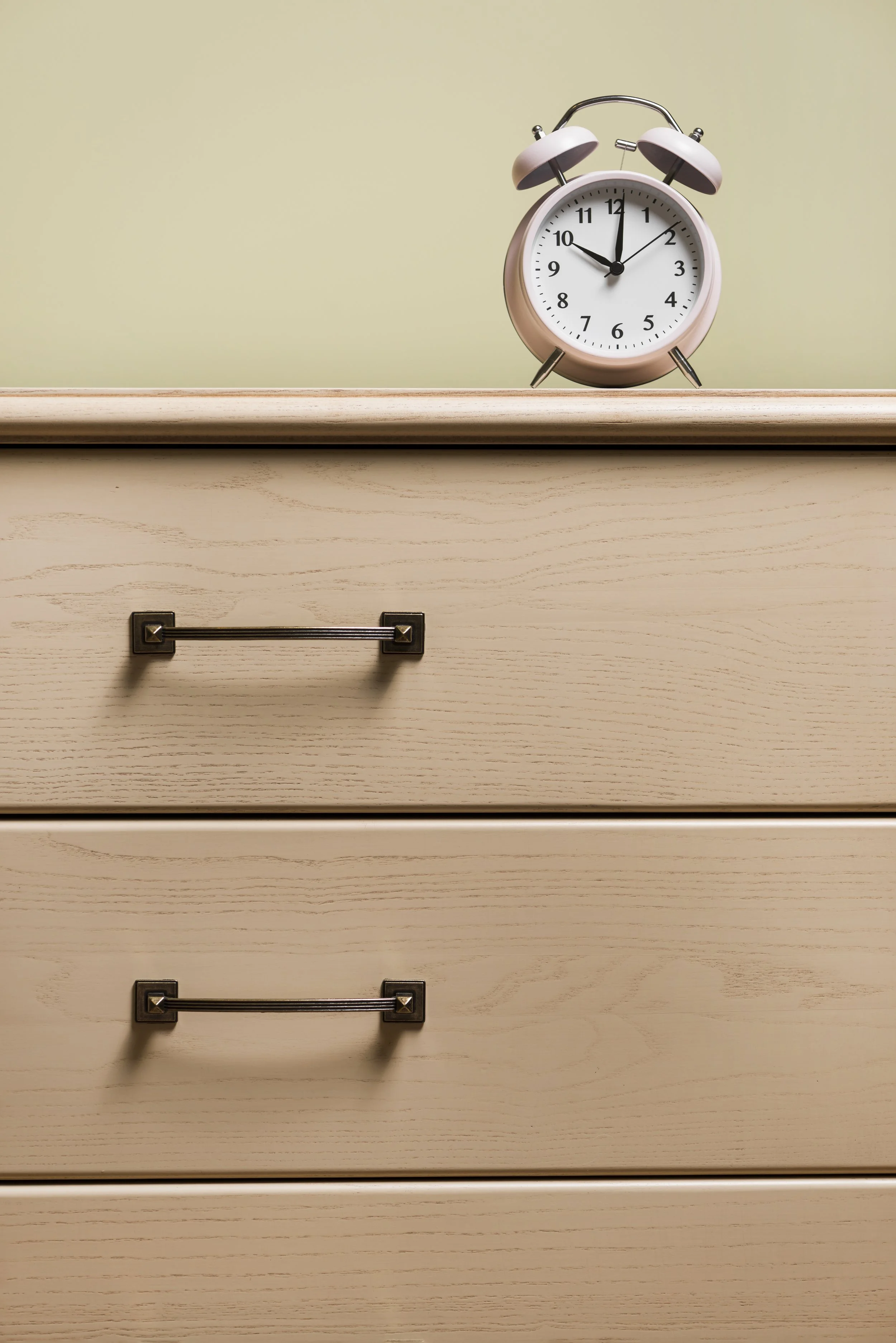 alarm-clock-wooden-closed-drawer.jpg