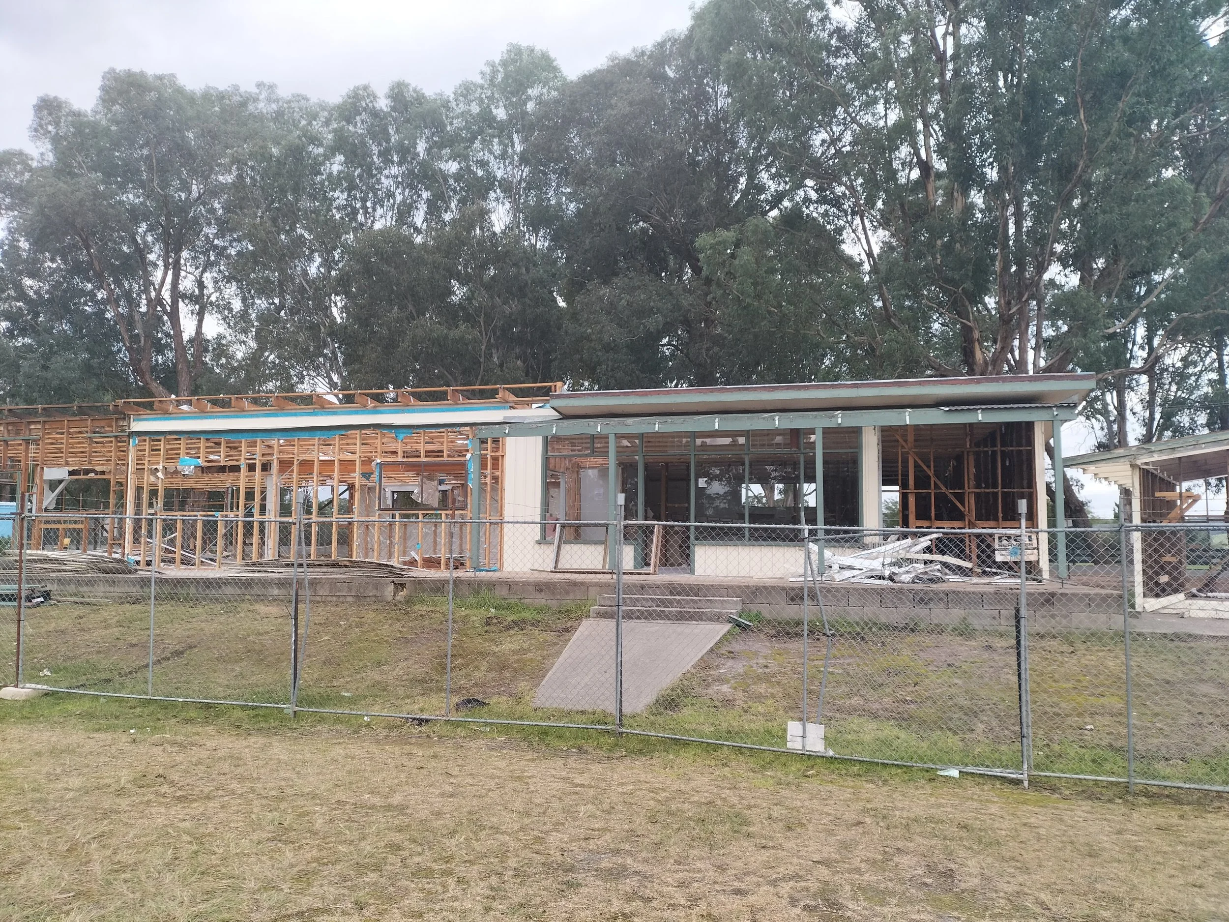 Demolition Crew dismantling hall.jpg