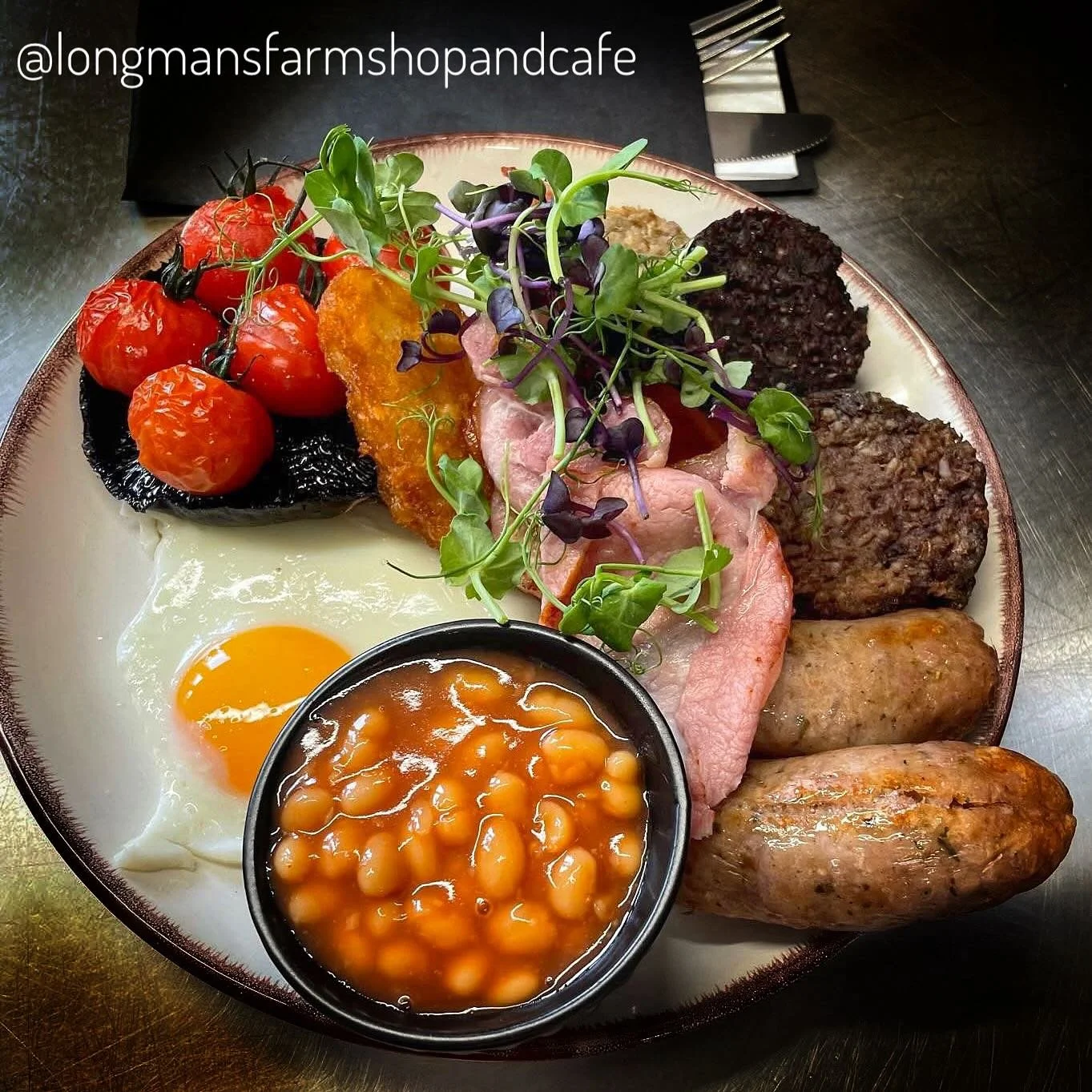 Autumnal weather has definitely arrived.  Here&rsquo;s a cheering, beautiful @longmansfarmshopandcafe plate to dive into. Plump sausages, the freshest of eggs, you just know how this is going to taste.  Regular customers these past few years, we have