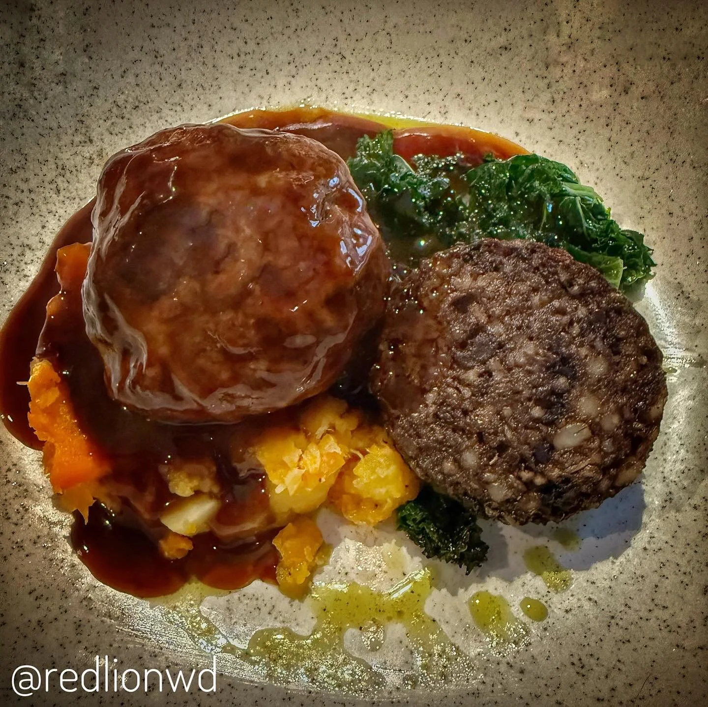 With Storm Claudia lashing outside yesterday, @redlionwd in West Deeping (East of Stamford), Lincs welcomed us with elevated, sumptuously prepared seasonal plates. Obviously, we had to have Frazer&rsquo;s rich faggots, root veg with a handsome lump o
