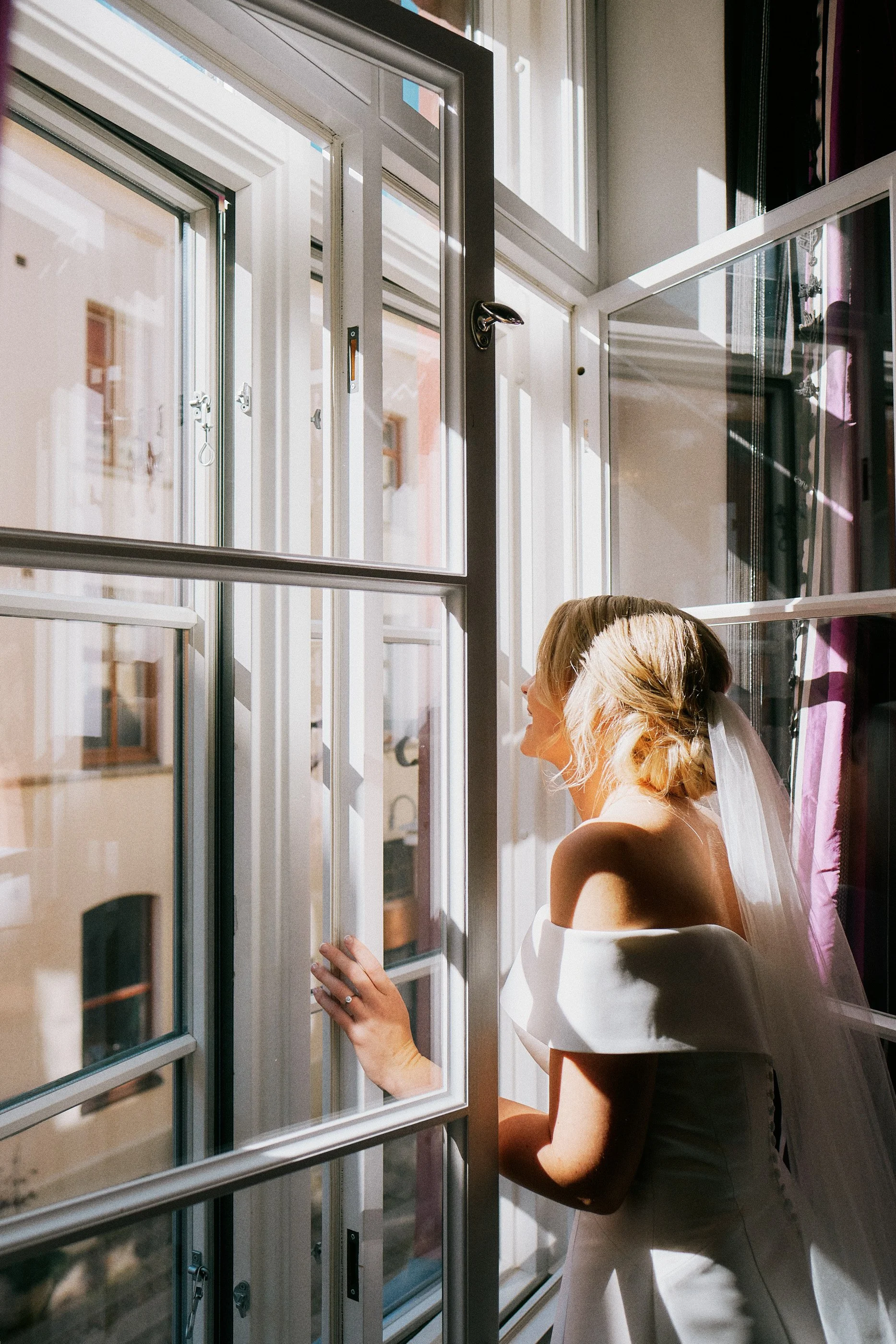 Bride in window light at Dorsia Hotel in Gothenburg