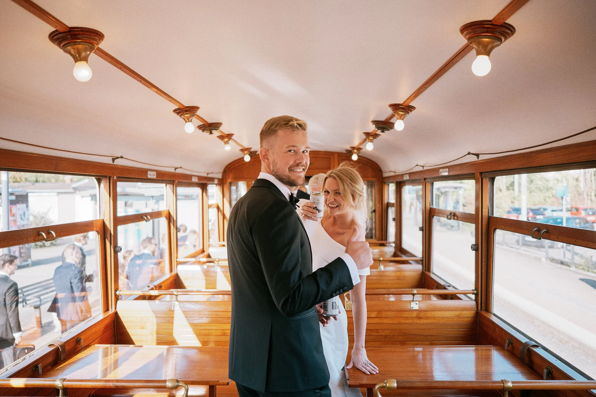 Bride and groom inside wedding tram in Gothenburg