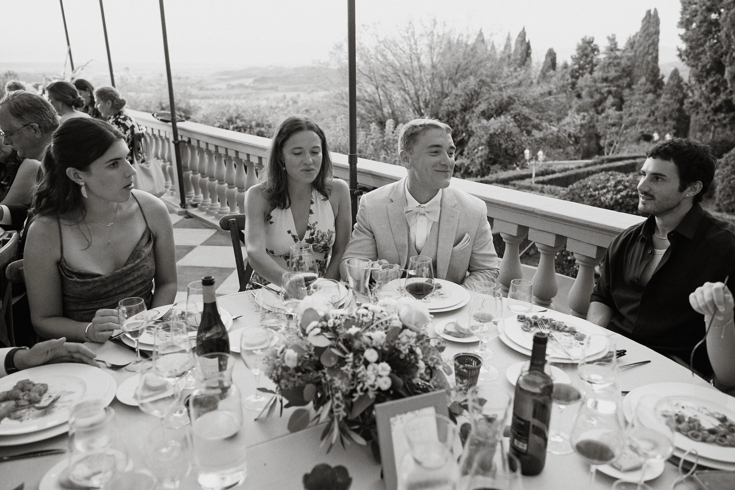 Bride and groom during outdoor reception in Tuscany