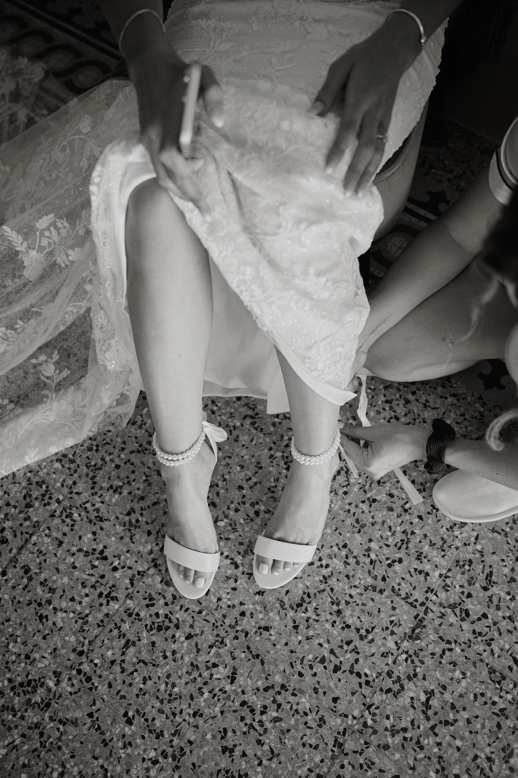 Wedding shoe detail during Tuscany wedding preparations