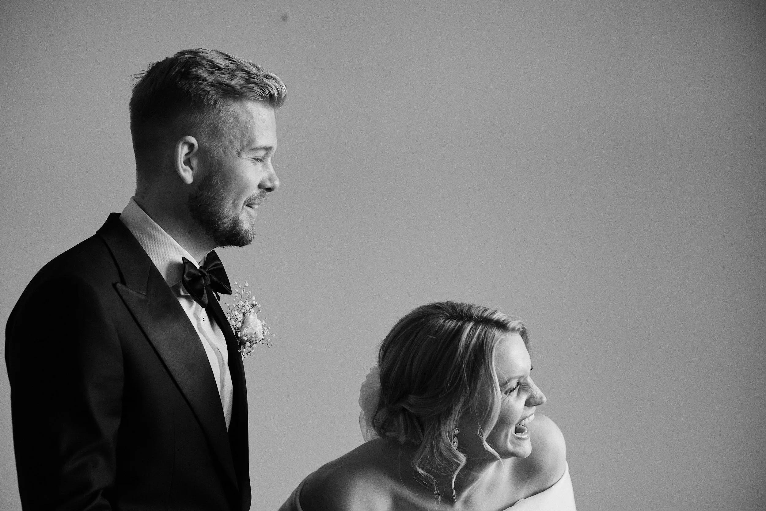 Bride and groom laughing during wedding in Gothenburg