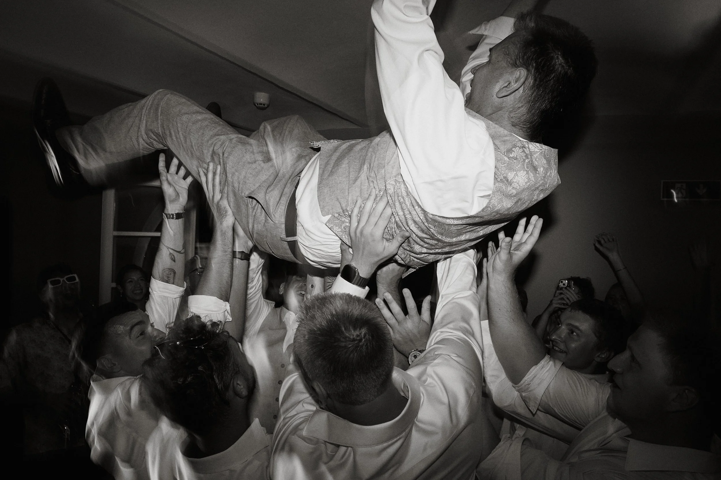 Groom lifted during wedding celebration in Italy