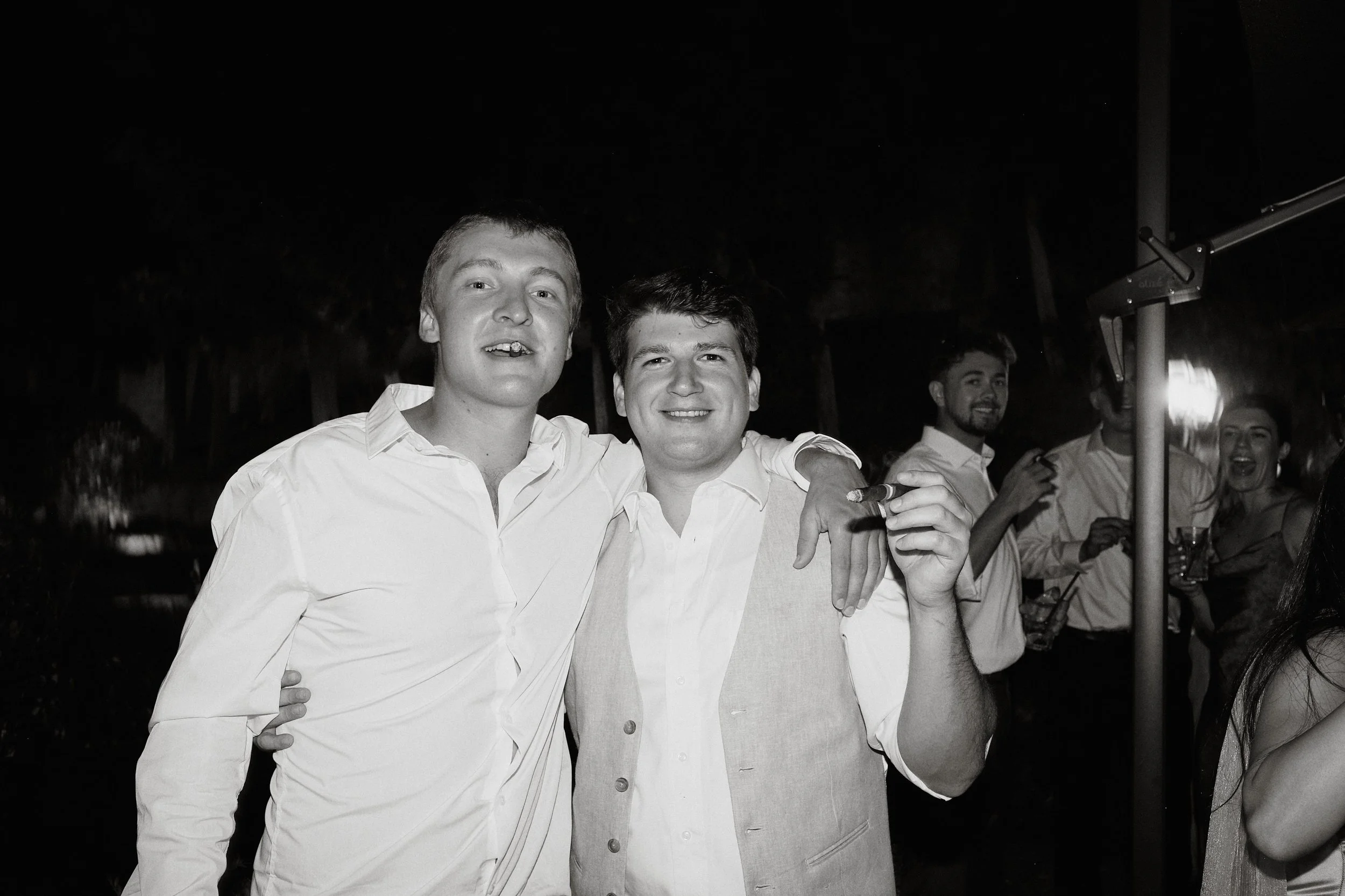 Guests celebrating late night during Tuscany wedding