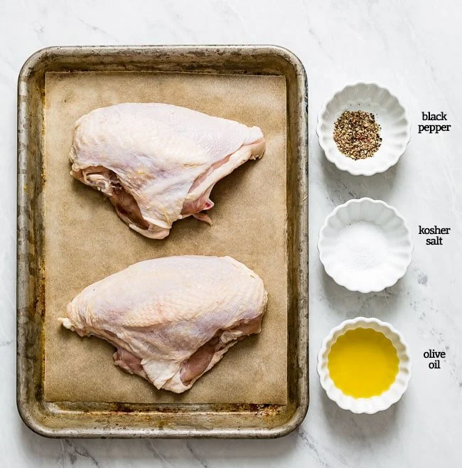 bone in chicken breasts bare.jpg