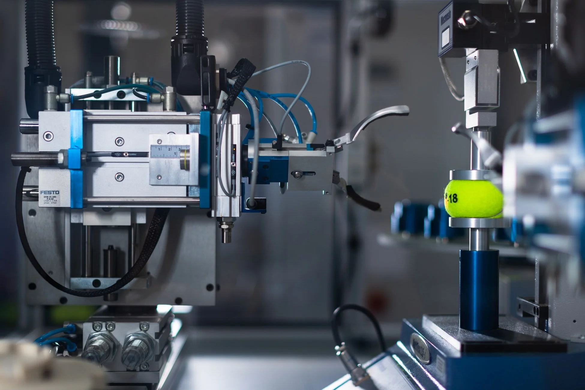research and development. two woman and 1 man around a laptop