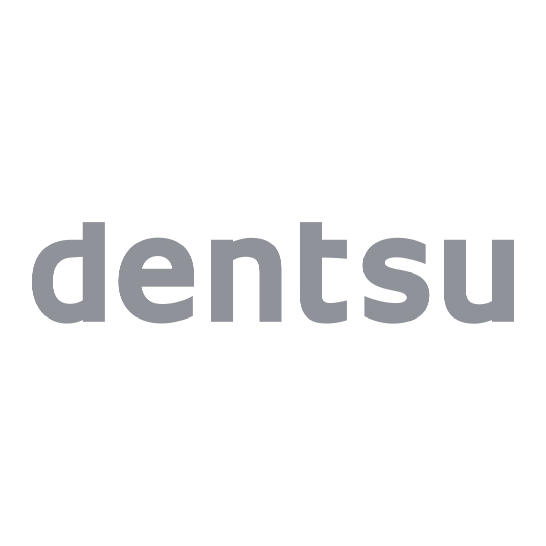 Logo of Dentsu with a stylized emblem above and the company name in gray text below.