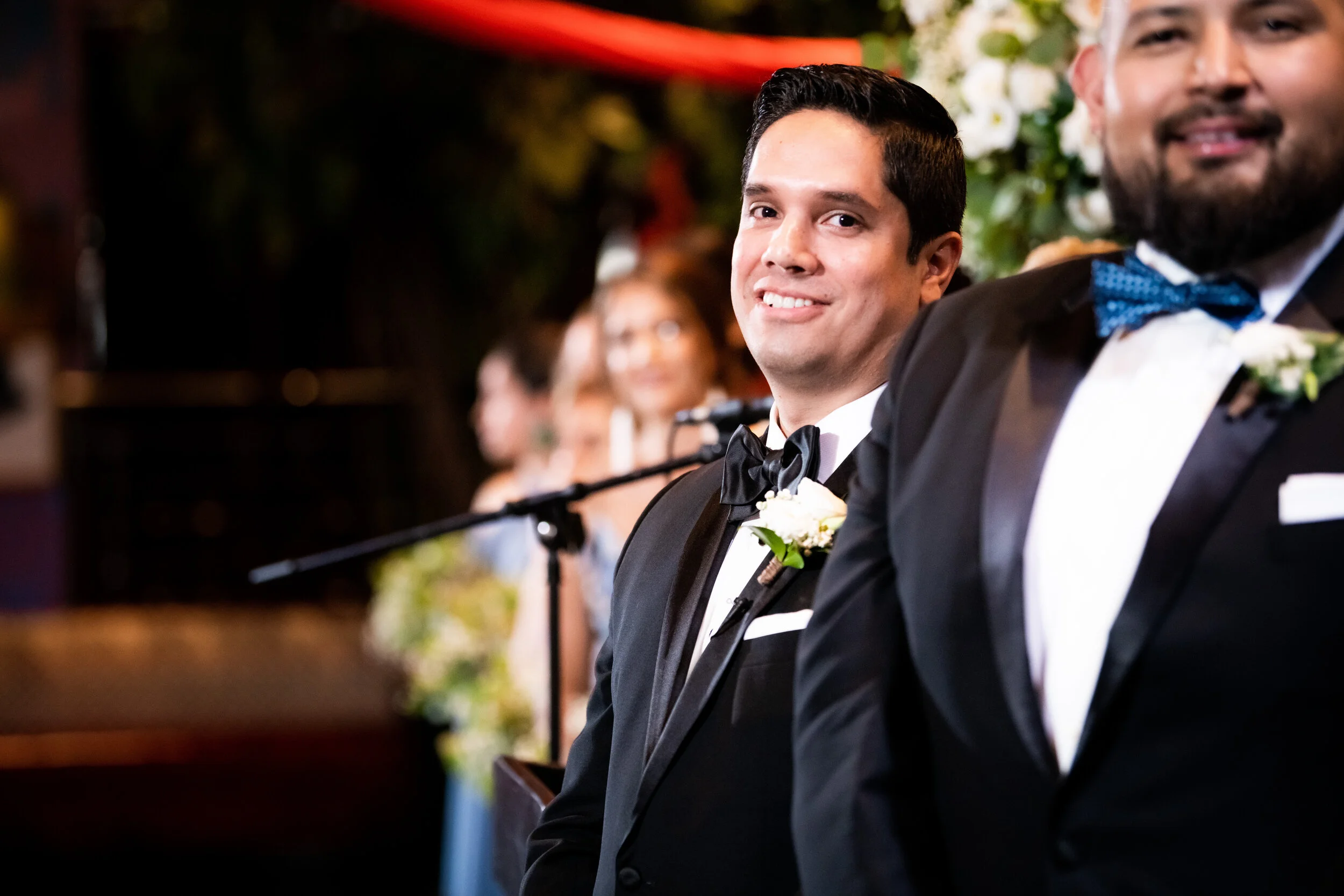 Bride escorted by parents down the aisle: Carnivale Chicago Wedding captured by J. Brown Photography