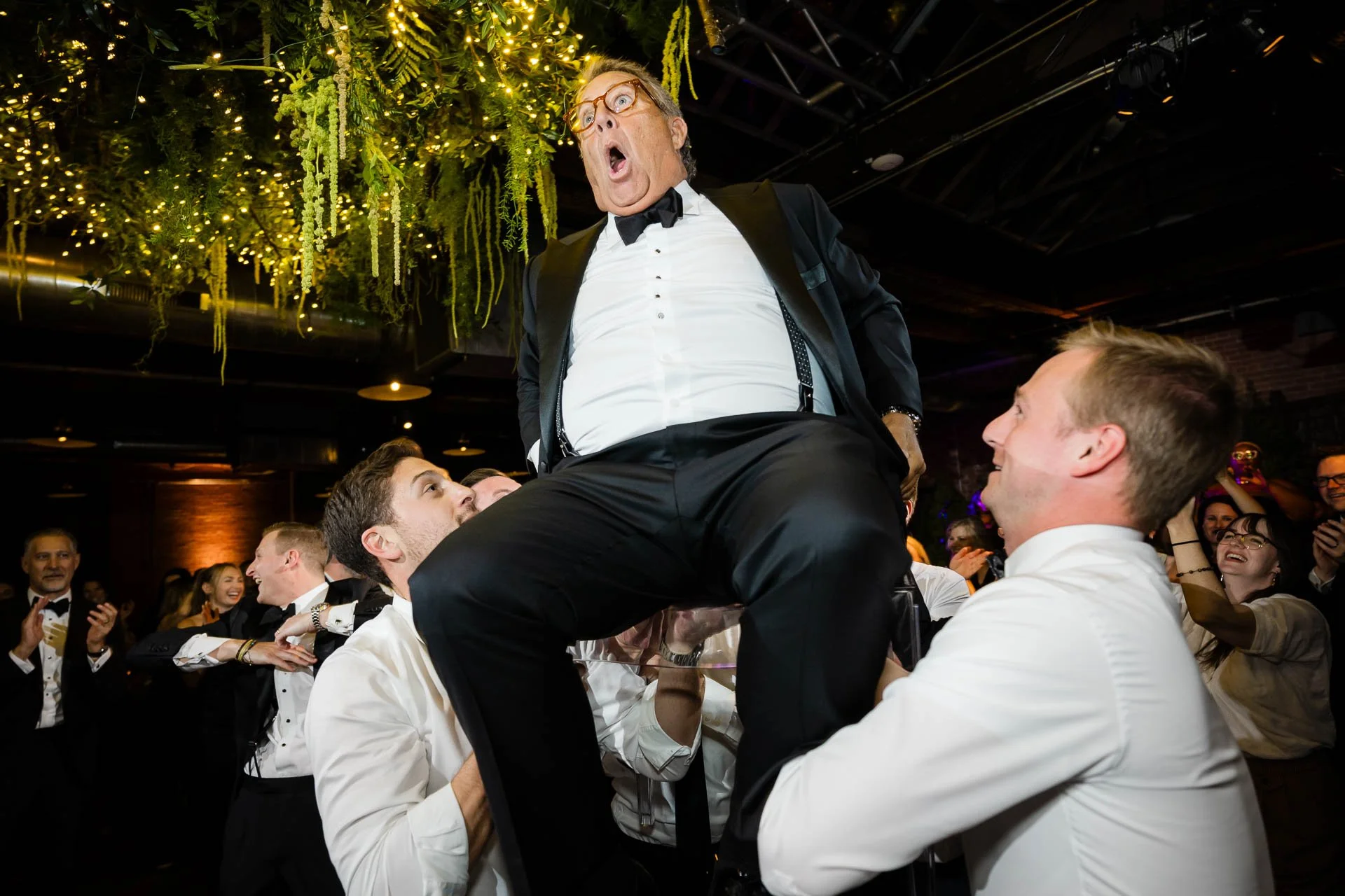 Morgan Manufacturing | hilarious photo father of the bride during the hora | Chicago IL