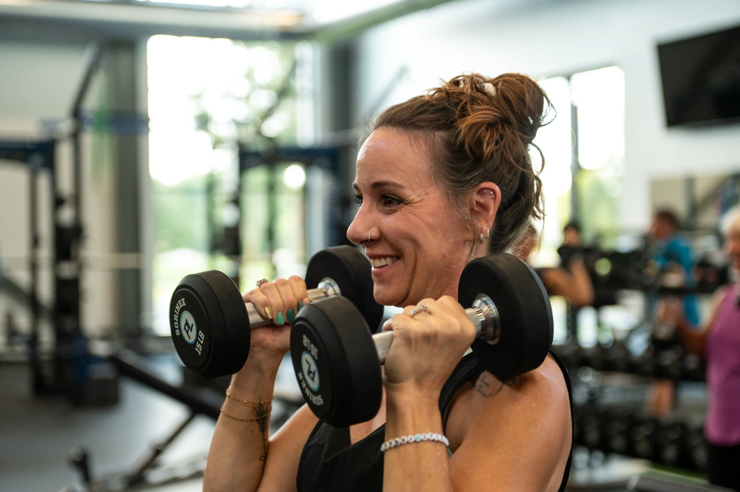 hands lifting weights