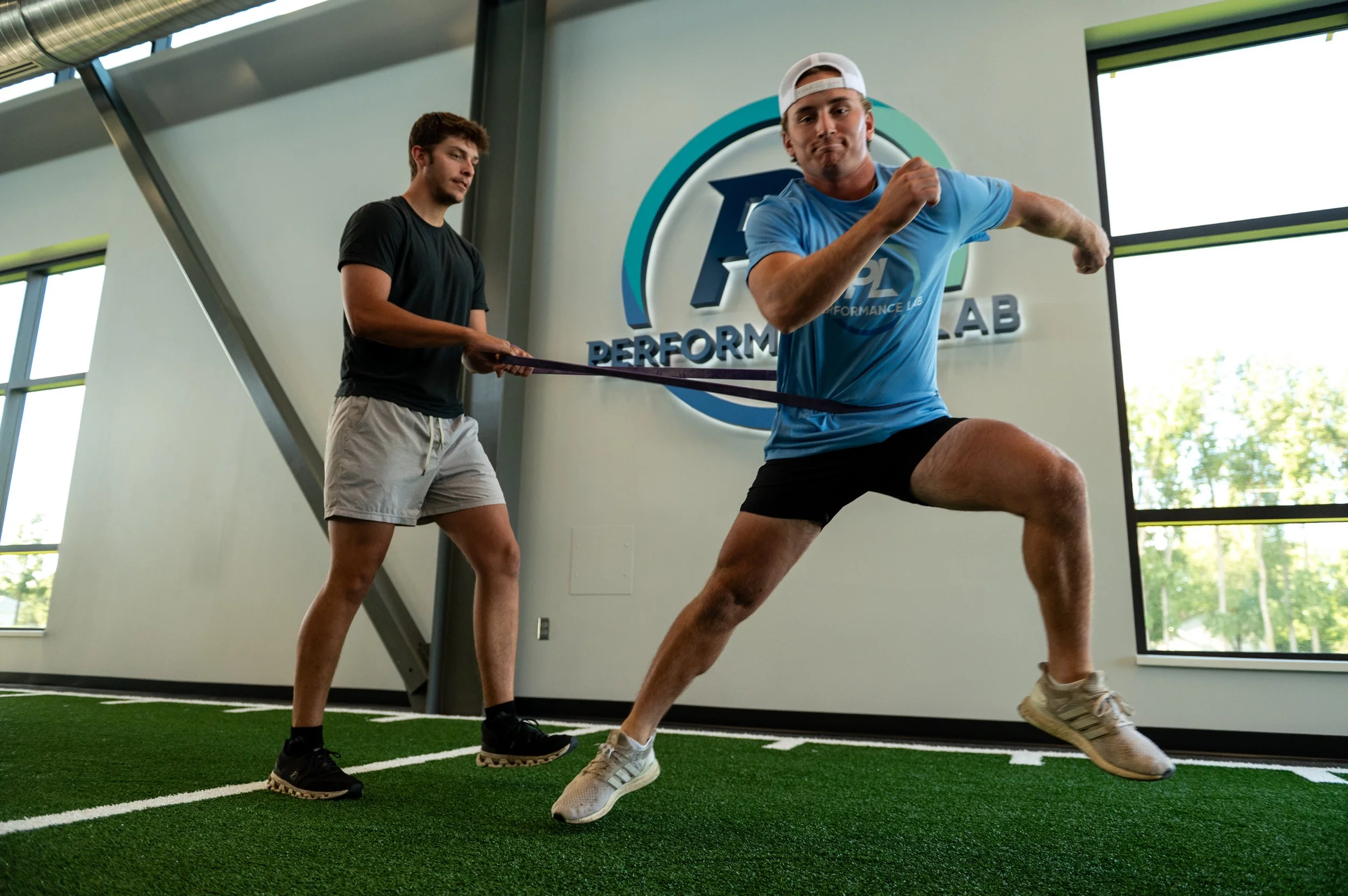 Athlete jumping on turf