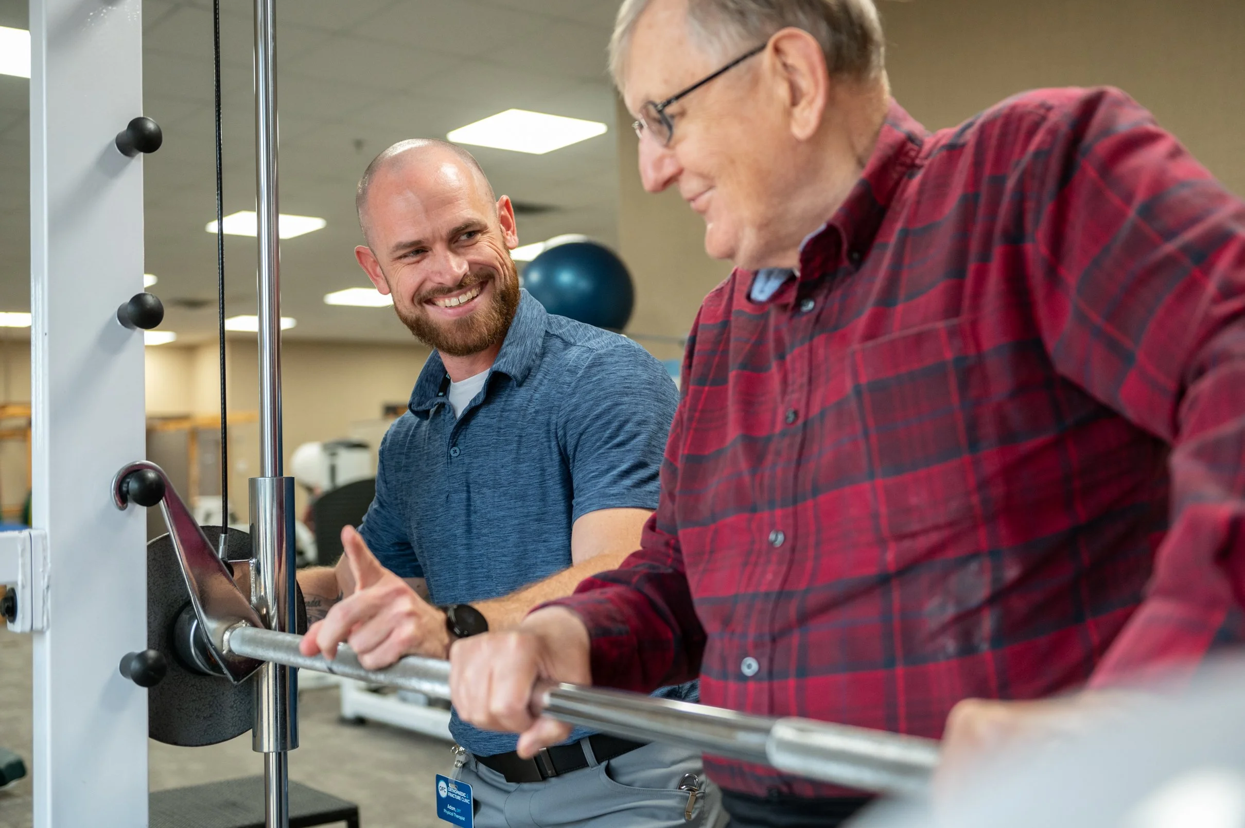 patient working with physical therapist