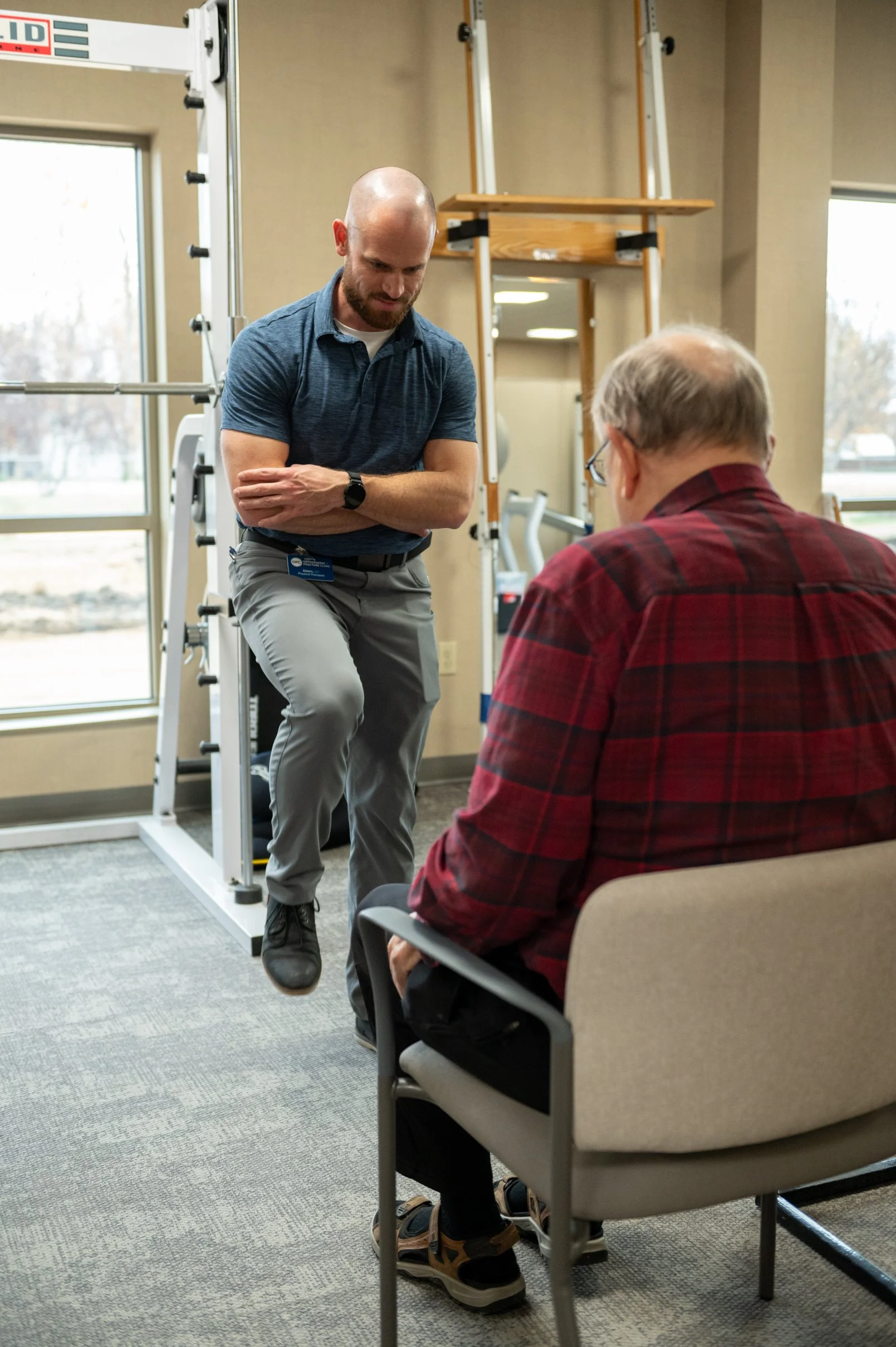 physical therapist working with patient