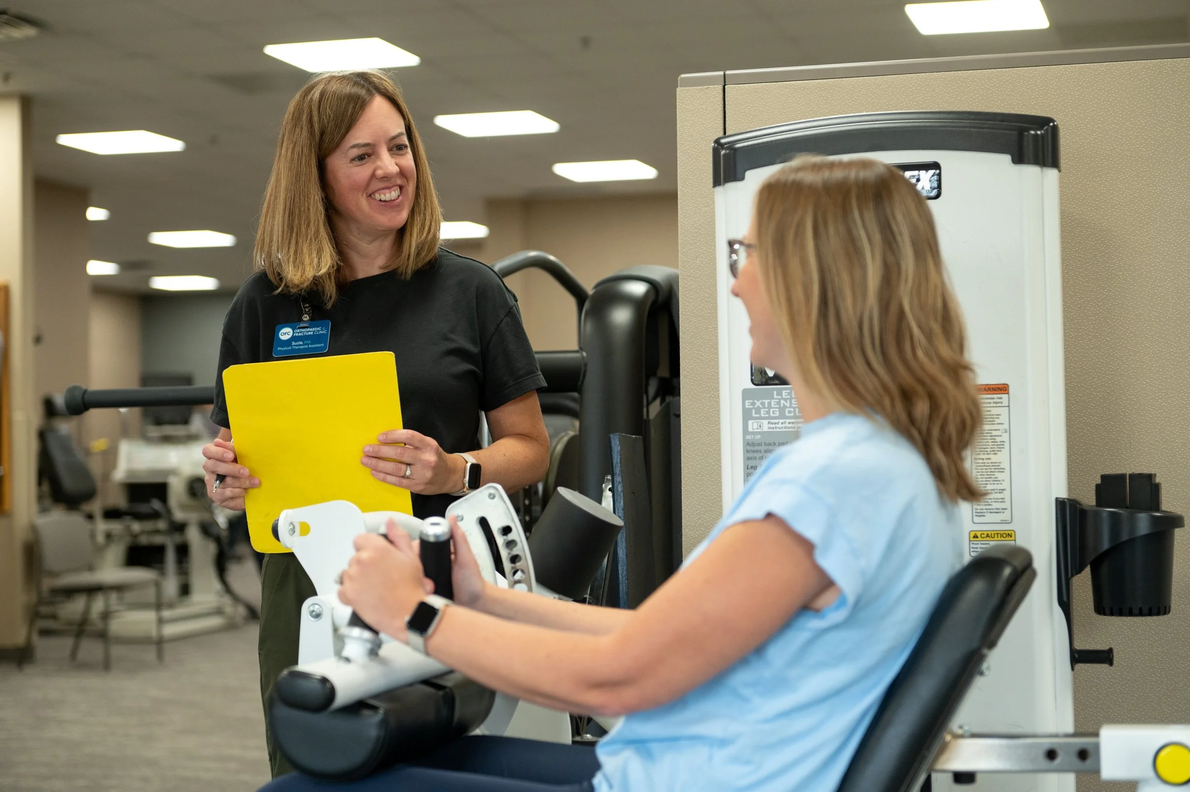trainer working with patient