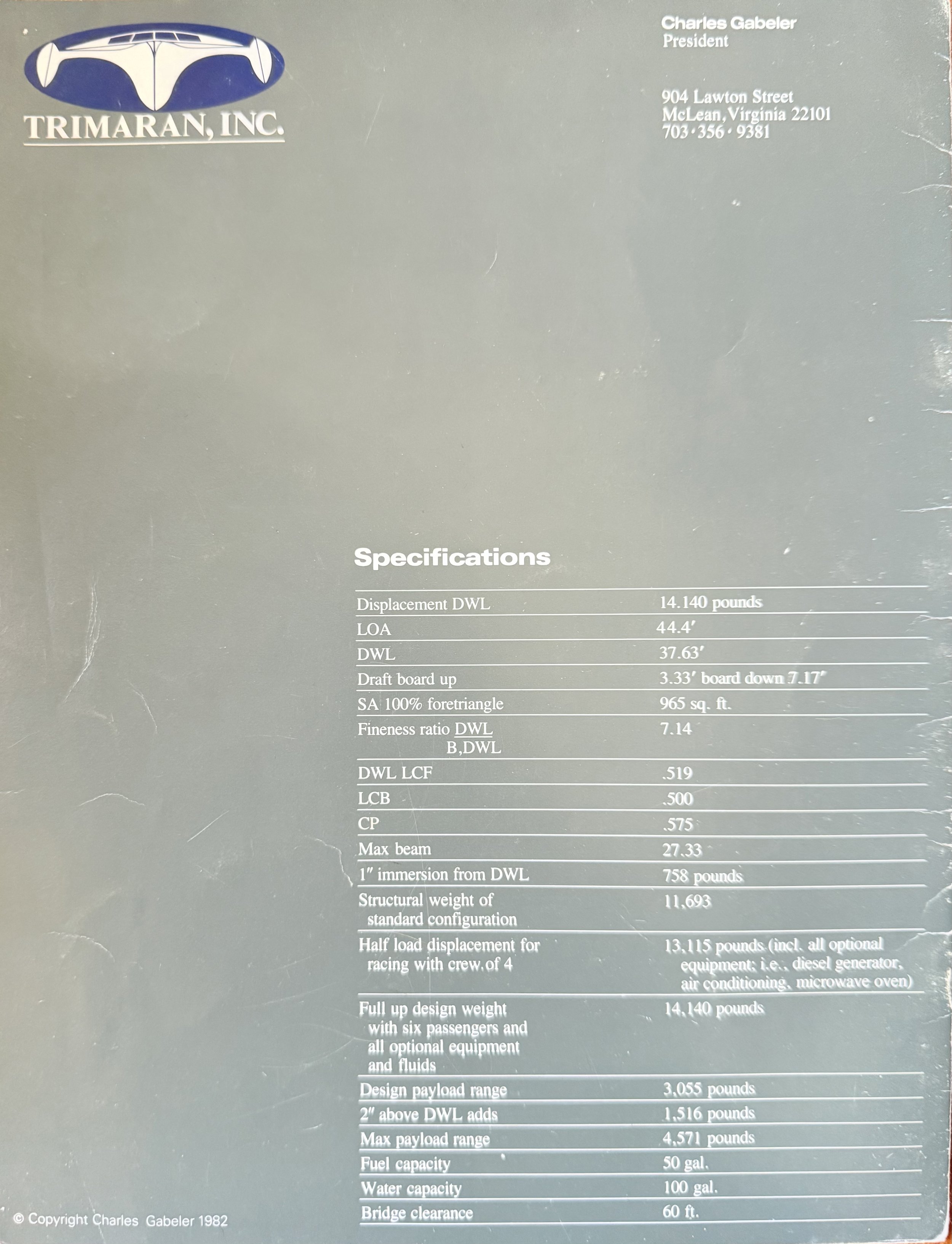 Image of a brochure page from Trimaran, Inc. featuring a logo, company address, and technical specifications of a vessel, including dimensions, displacement, and design details. Copyright 1982 by Charles Gabeler.