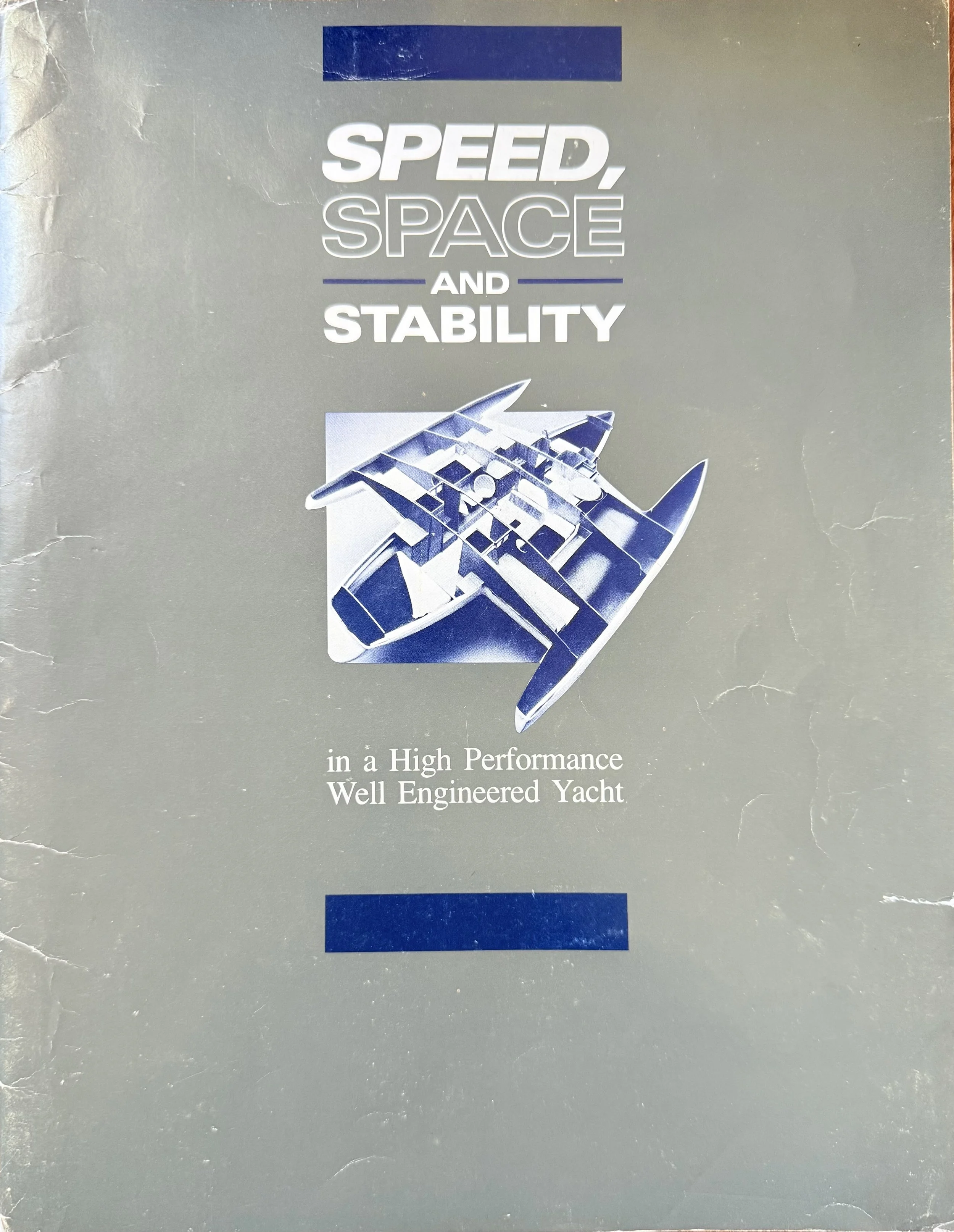 Brochure cover featuring the text "Speed, Space, and Stability" with an image of a high-performance yacht.
