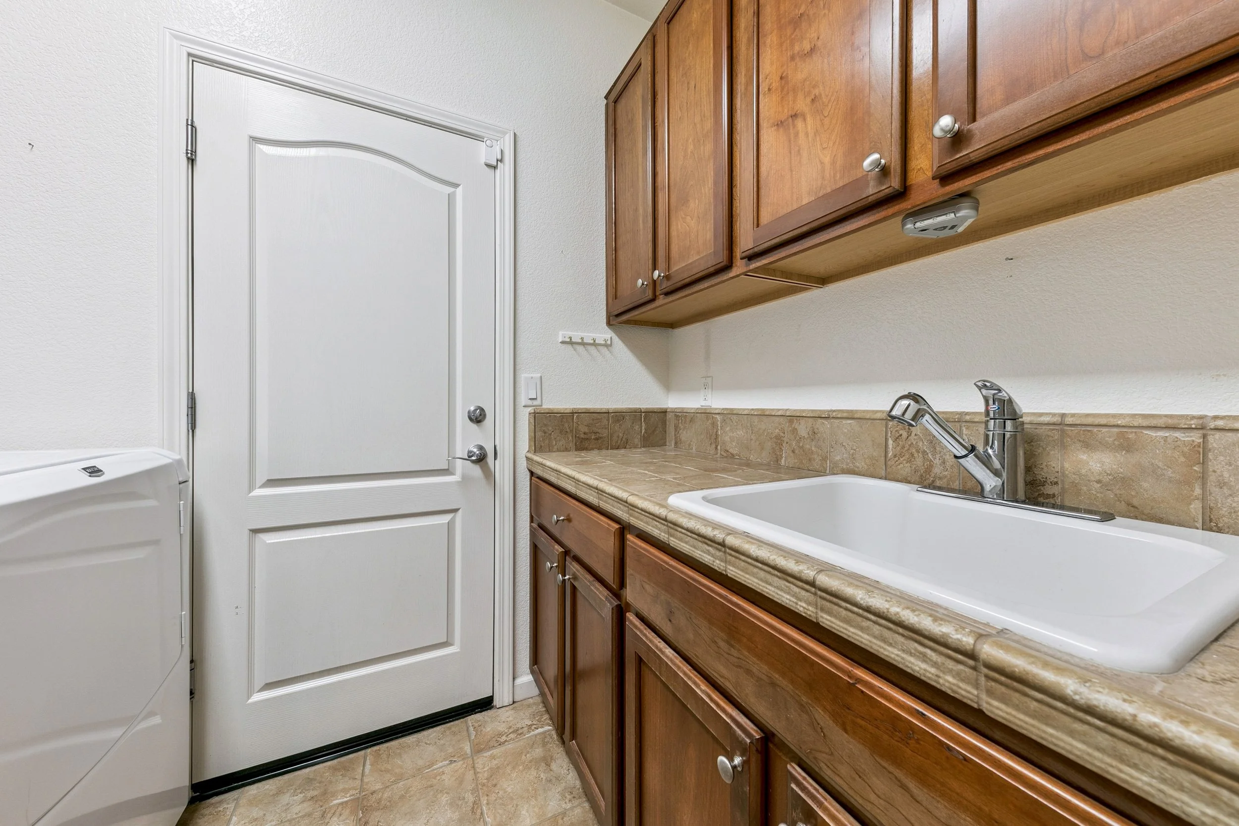 canopy-real-estate-14080-tagor-road-laundry-room.jpg
